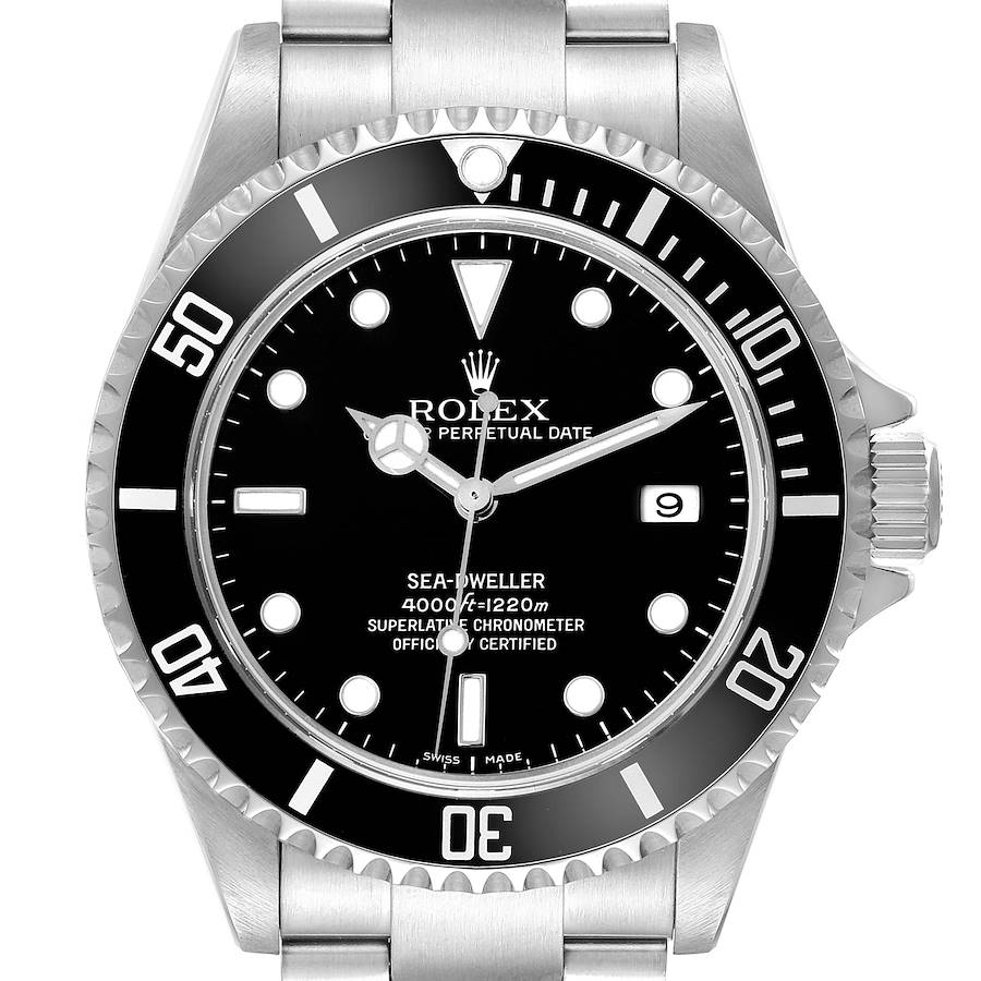 The Rolex Sea-Dweller watch is shown from the front, highlighting the dial, bezel, hands, and bracelet top links.