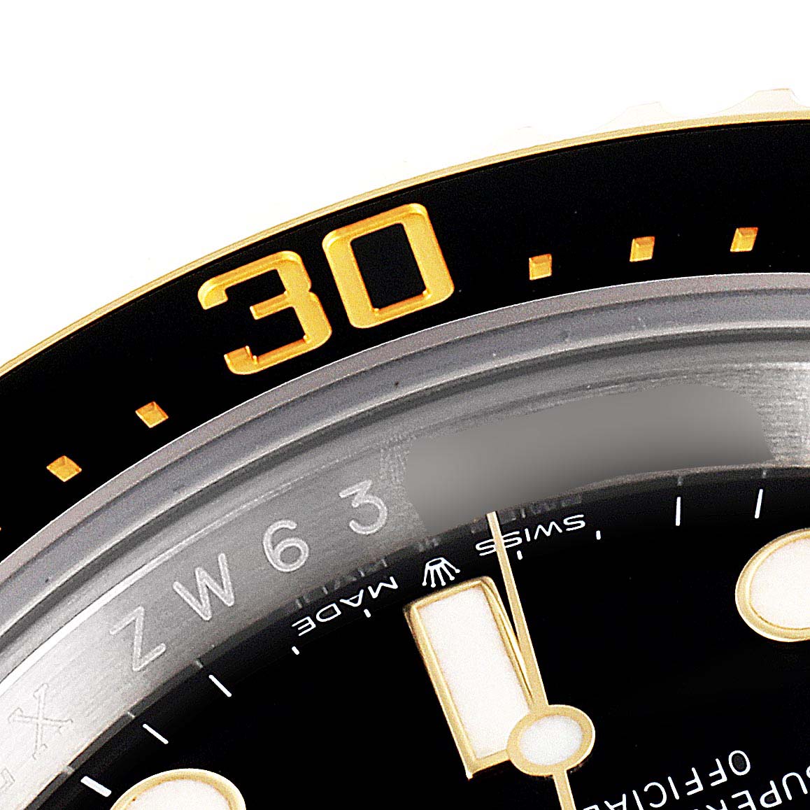 This close-up image shows the bezel and part of the dial of a Rolex Sea-Dweller 126603 Men's Steel and Gold (two tone) Black Dial 126603 Men's Steel and Gold (two tone) Black Dial watch.