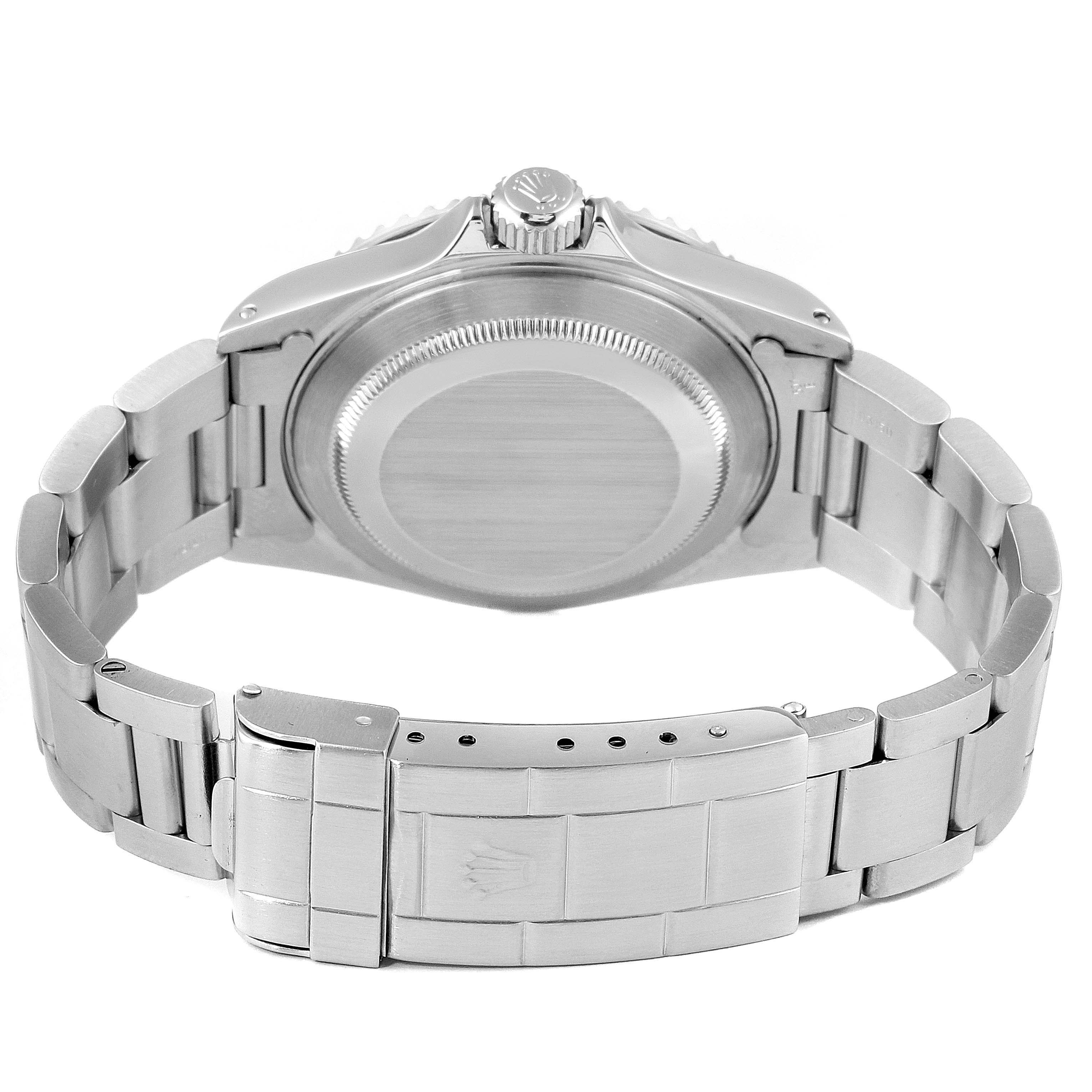 This image shows the backside, clasp, and bracelet of a Rolex Submariner 14060M Men
s Stainless Steel Black Dial 14060M Men
s Stainless Steel Black Dial watch in a slightly angled view from the back.