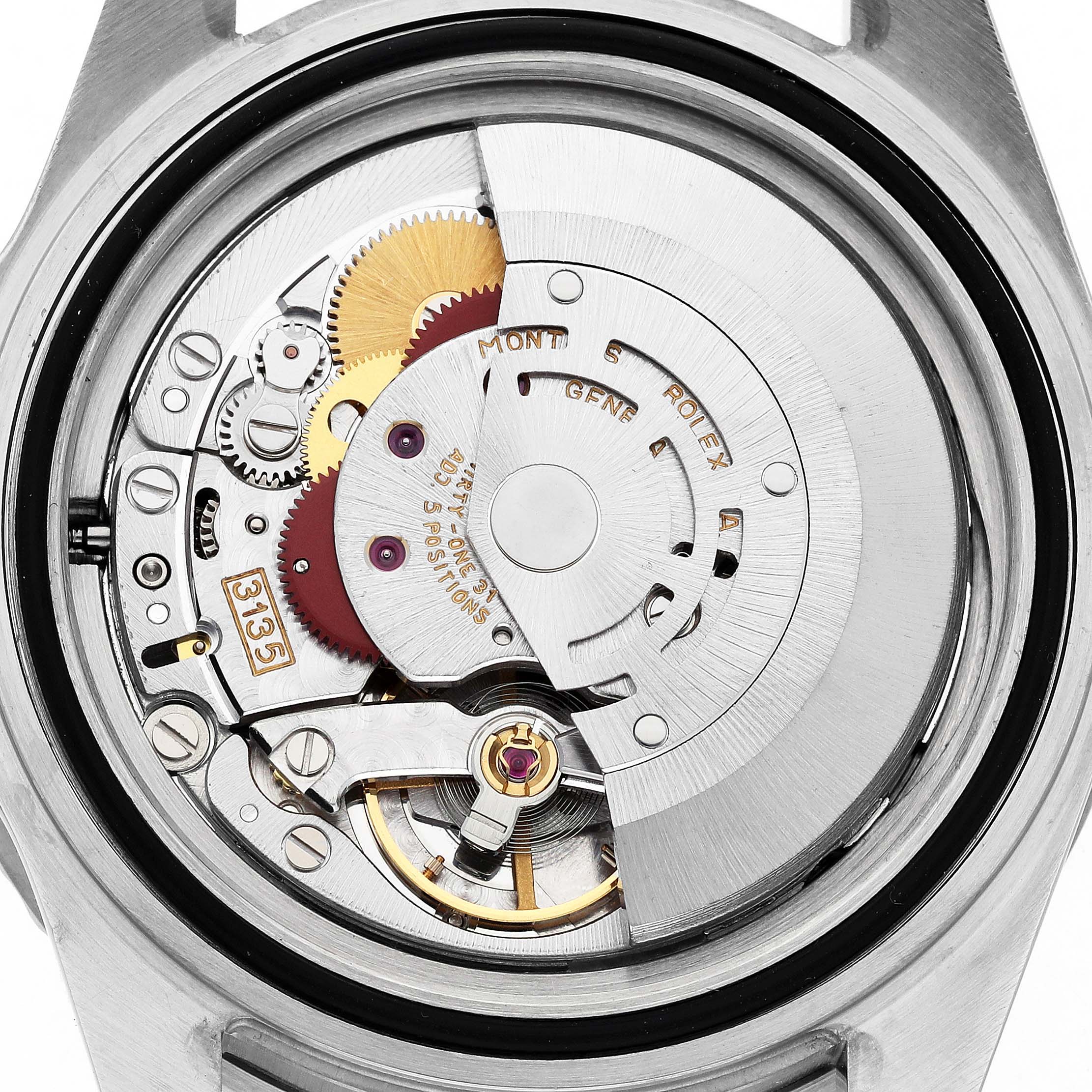 The image shows the movement of a Rolex Submariner 16610 Men's Stainless Steel Black Dial, displaying the intricate gears and rotor from a back angle.