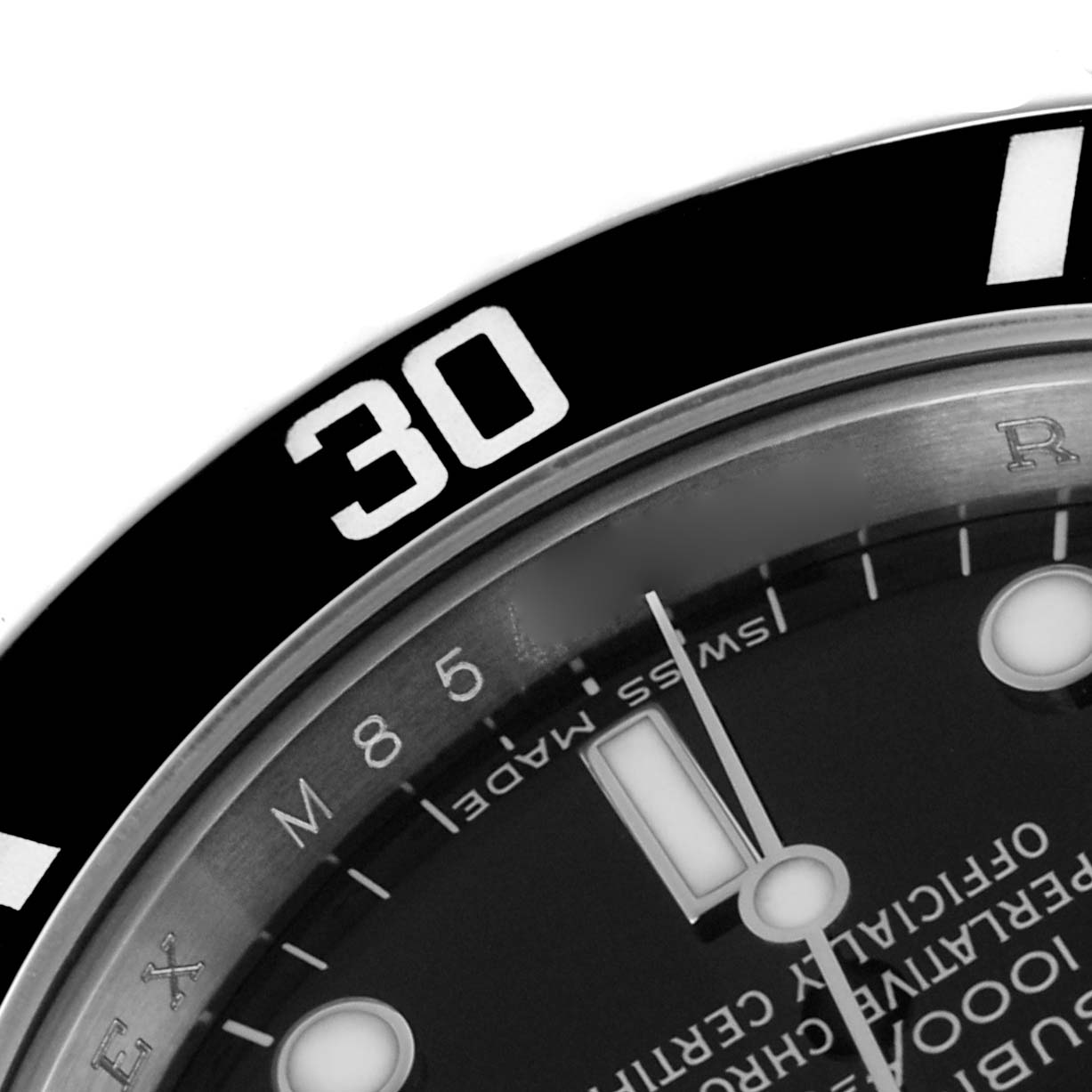 The close-up image of the Rolex Submariner 14060M Men's Stainless Steel Black Dial 14060M Men's Stainless Steel Black Dial shows part of the bezel, dial, and watch hands from an angled perspective.