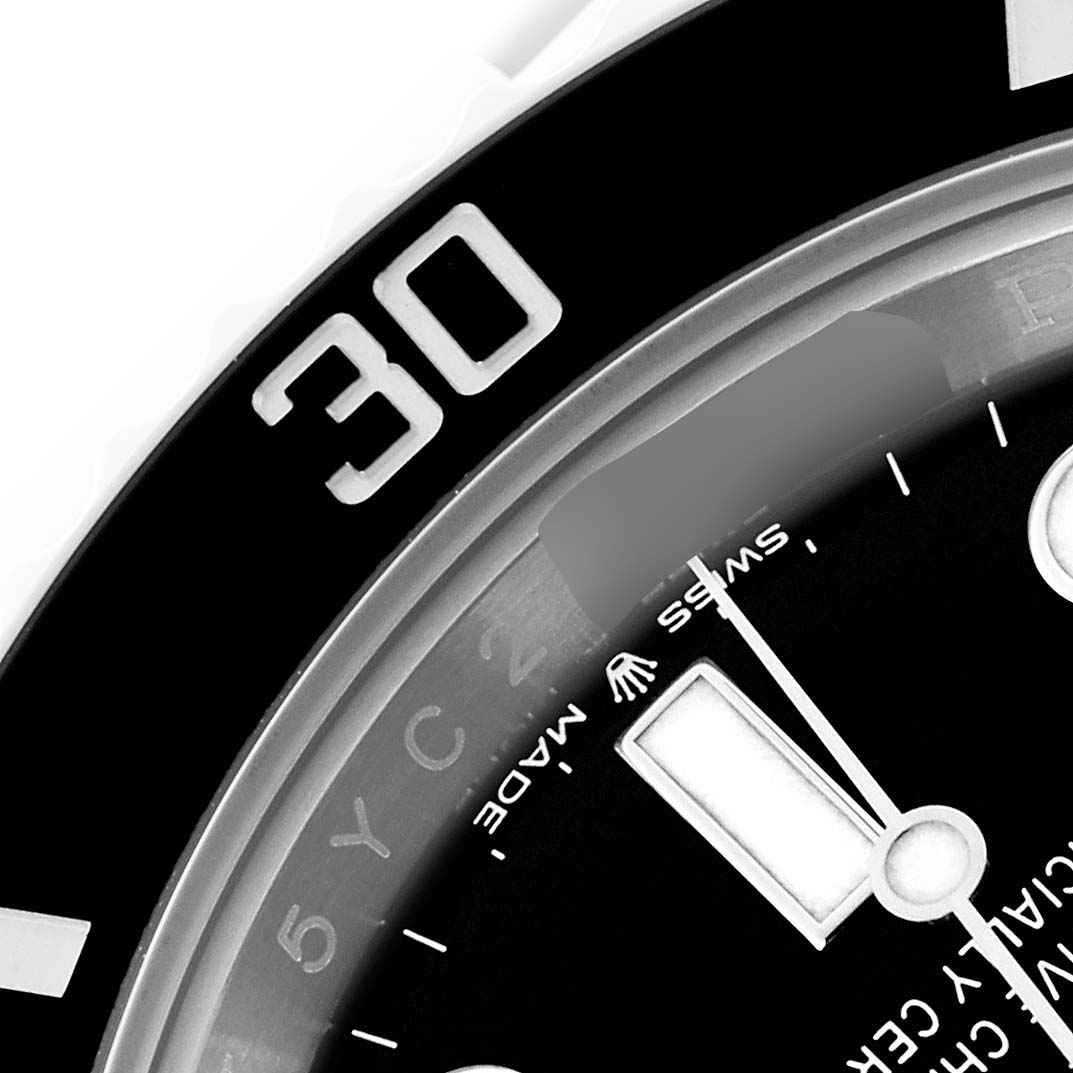 The image shows a close-up of the Rolex Submariner 124060 Men's Stainless Steel Black Dial 124060 Men's Stainless Steel Black Dial's bezel and dial, focusing on the "30" mark.