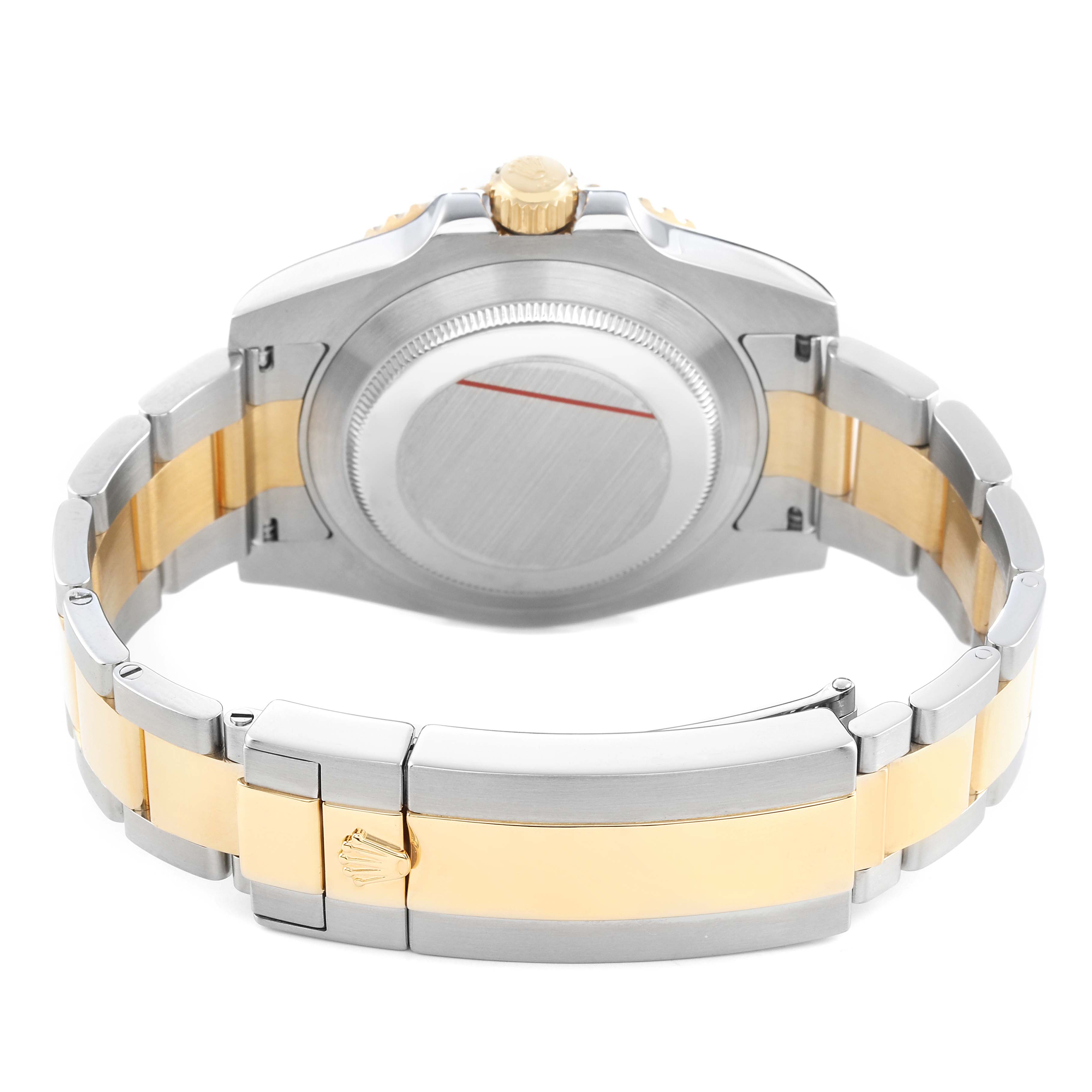 The image shows the back of a Rolex Submariner 116613 Men's Steel and Gold (two tone) Black Dial, highlighting its two-tone bracelet, case back, and crown.