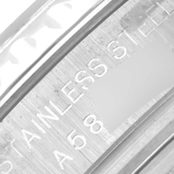 The image shows a close-up of the inner case back or rehault of a Rolex Yacht-Master 169622 Women
s Stainless Steel Silver Dial 169622 Women
s Stainless Steel Silver Dial, highlighting the "STAINLESS STEEL" engraving.