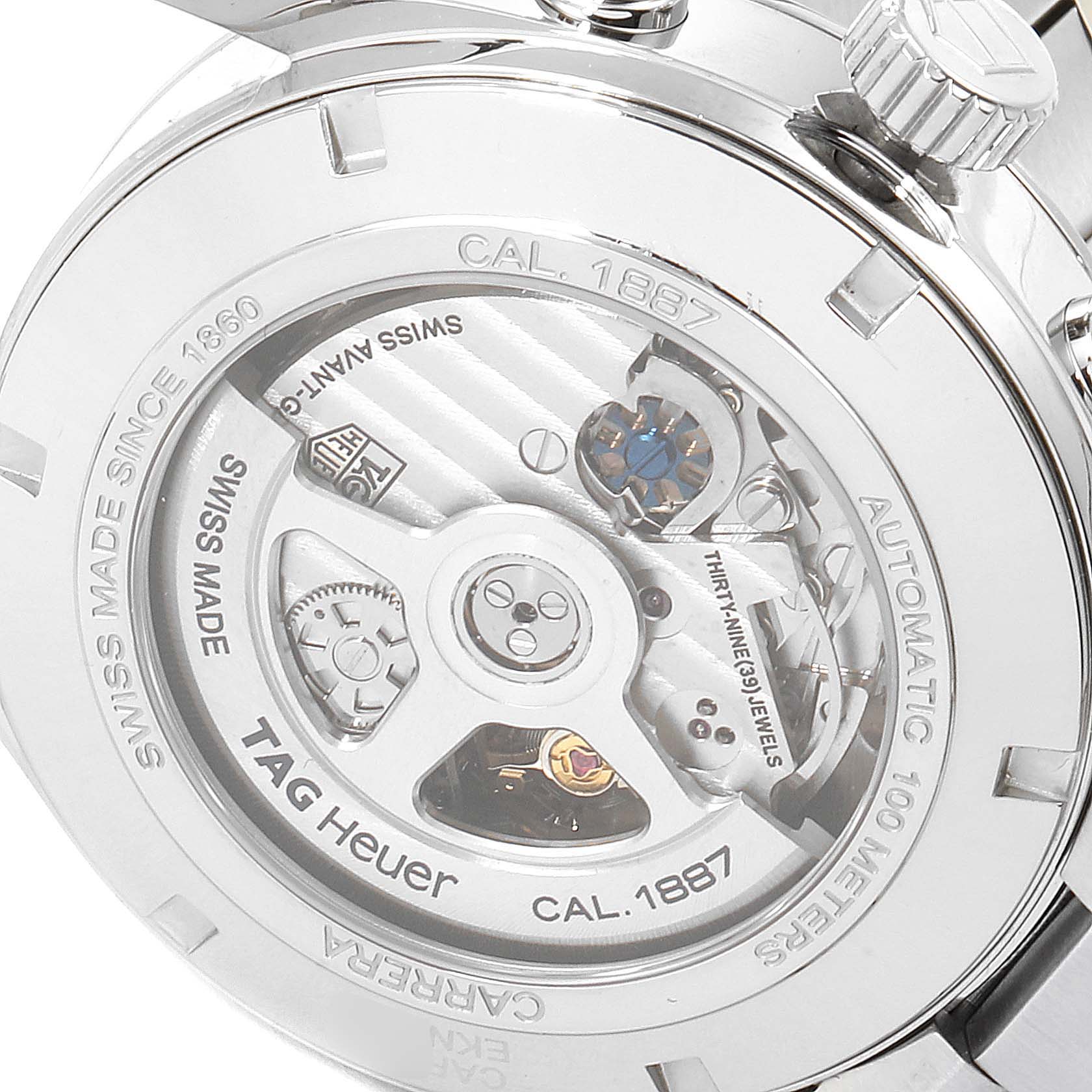 The image shows the back of a Tag Heuer Carrera CAR2012.BA0796 Men
s Stainless Steel Silver Dial CAR2012.BA0796 Men
s Stainless Steel Silver Dial watch, highlighting its Calibre 1887 automatic movement.