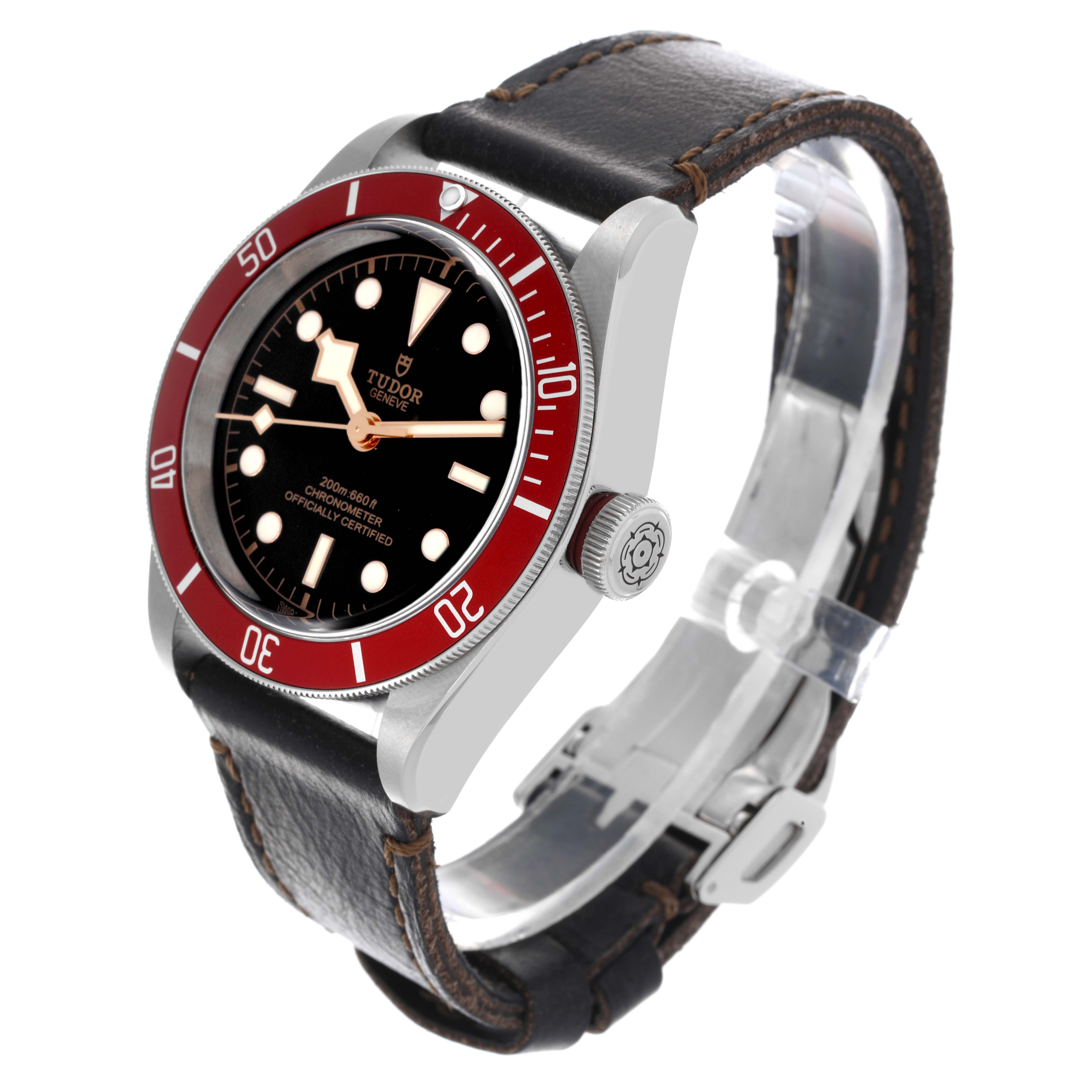 The Tudor Heritage Black Bay 79230R-0011 Men's Stainless Steel Black Dial 79230R-0011 Men's Stainless Steel Black Dial watch is shown at an angled side view, highlighting the red bezel, crown, and black leather strap.
