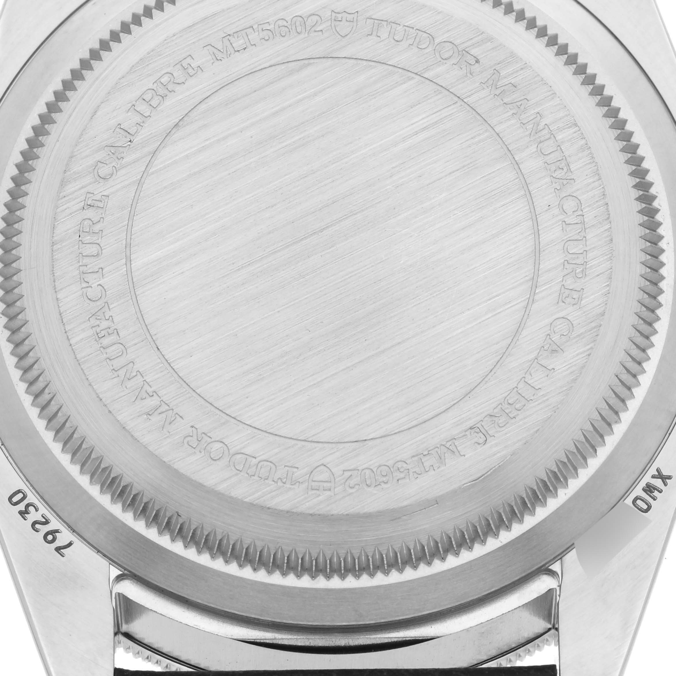 The image shows the back case of the Tudor Heritage Black Bay 79230R-0011 Men's Stainless Steel Black Dial 79230R-0011 Men's Stainless Steel Black Dial watch, highlighting the engraved details.