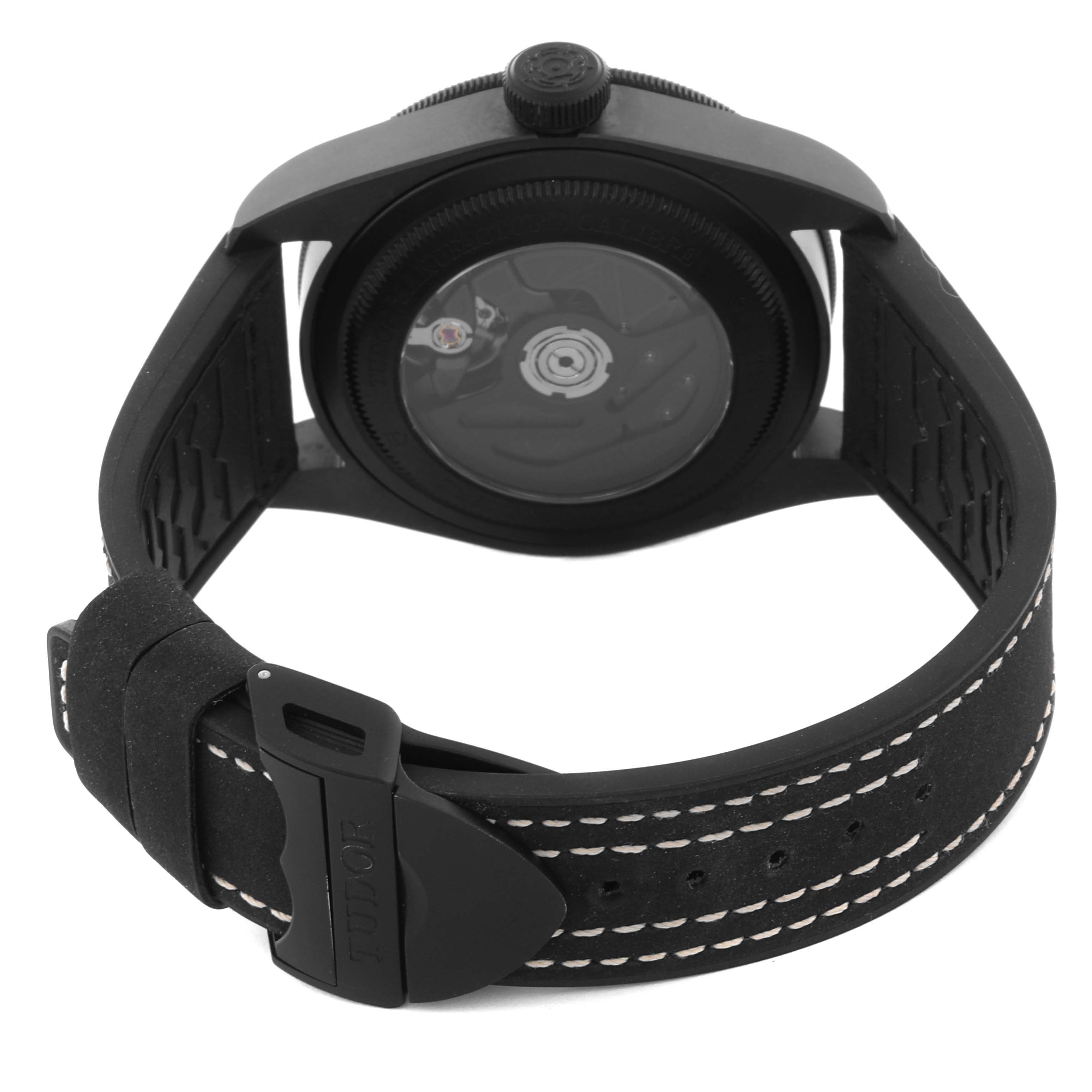 The Tudor Heritage Black Bay 79210CNU Men's Stainless Steel Black Dial 79210CNU Men's Stainless Steel Black Dial watch is shown from the rear, highlighting the case back, strap, and buckle.