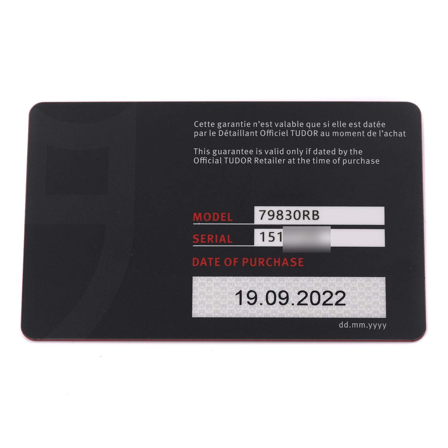 This image shows the warranty card for a Tudor Heritage Black Bay 79830RB-0003 Men's Stainless Steel Black Dial 79830RB-0003 Men's Stainless Steel Black Dial model, detailing the model and serial number.