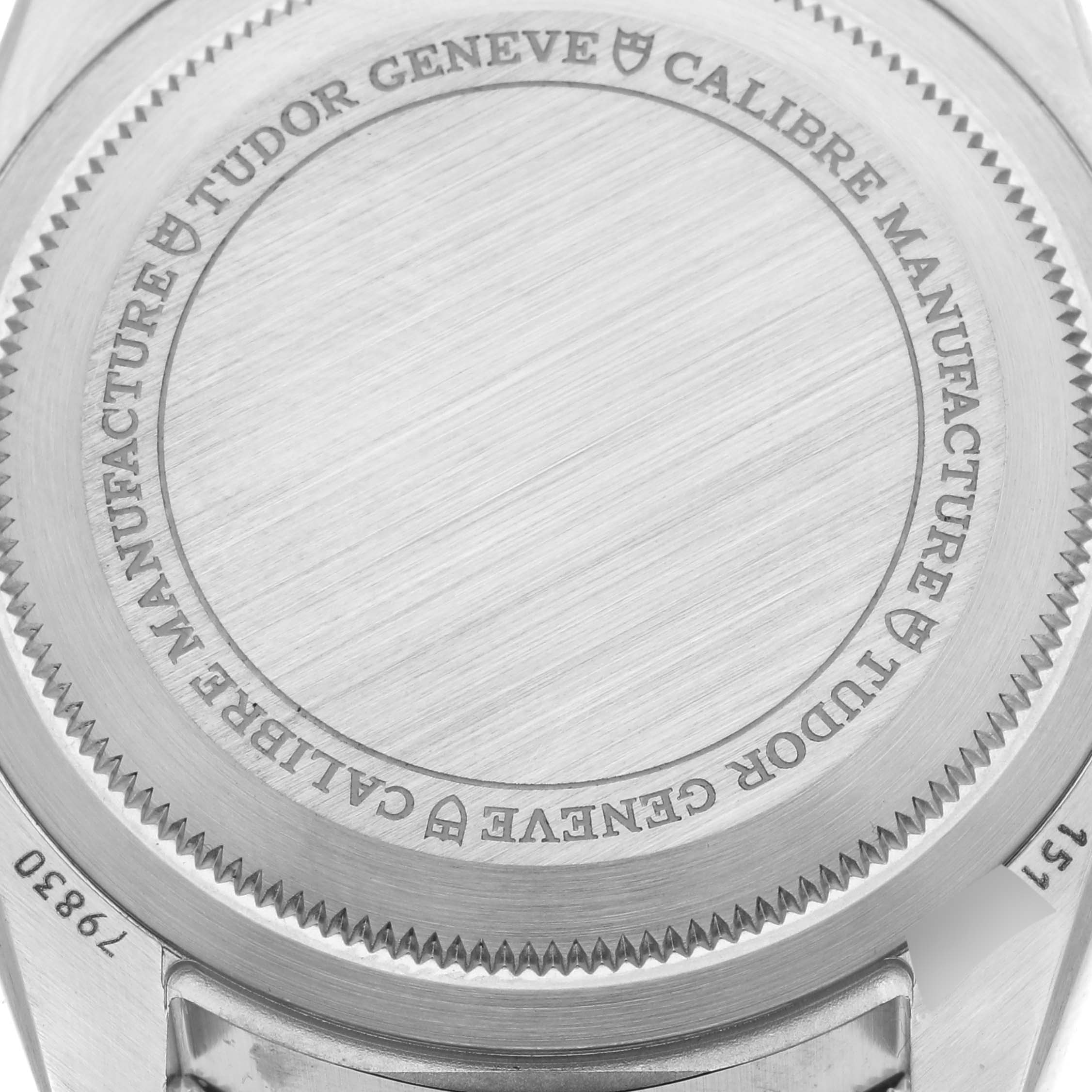 The image shows the case back of the Tudor Heritage Black Bay 79830RB-0003 Men's Stainless Steel Black Dial 79830RB-0003 Men's Stainless Steel Black Dial watch, displaying engraving details and metal finish.