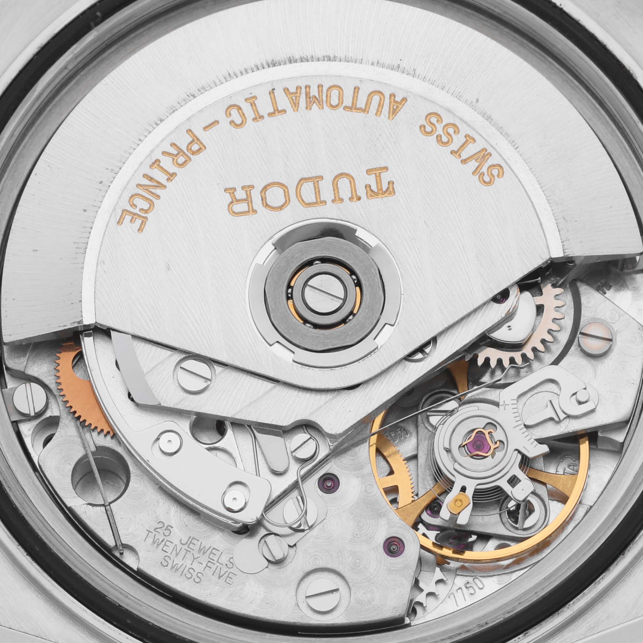The image shows the intricate movement of a Tudor Prince model watch from a top-down angle.