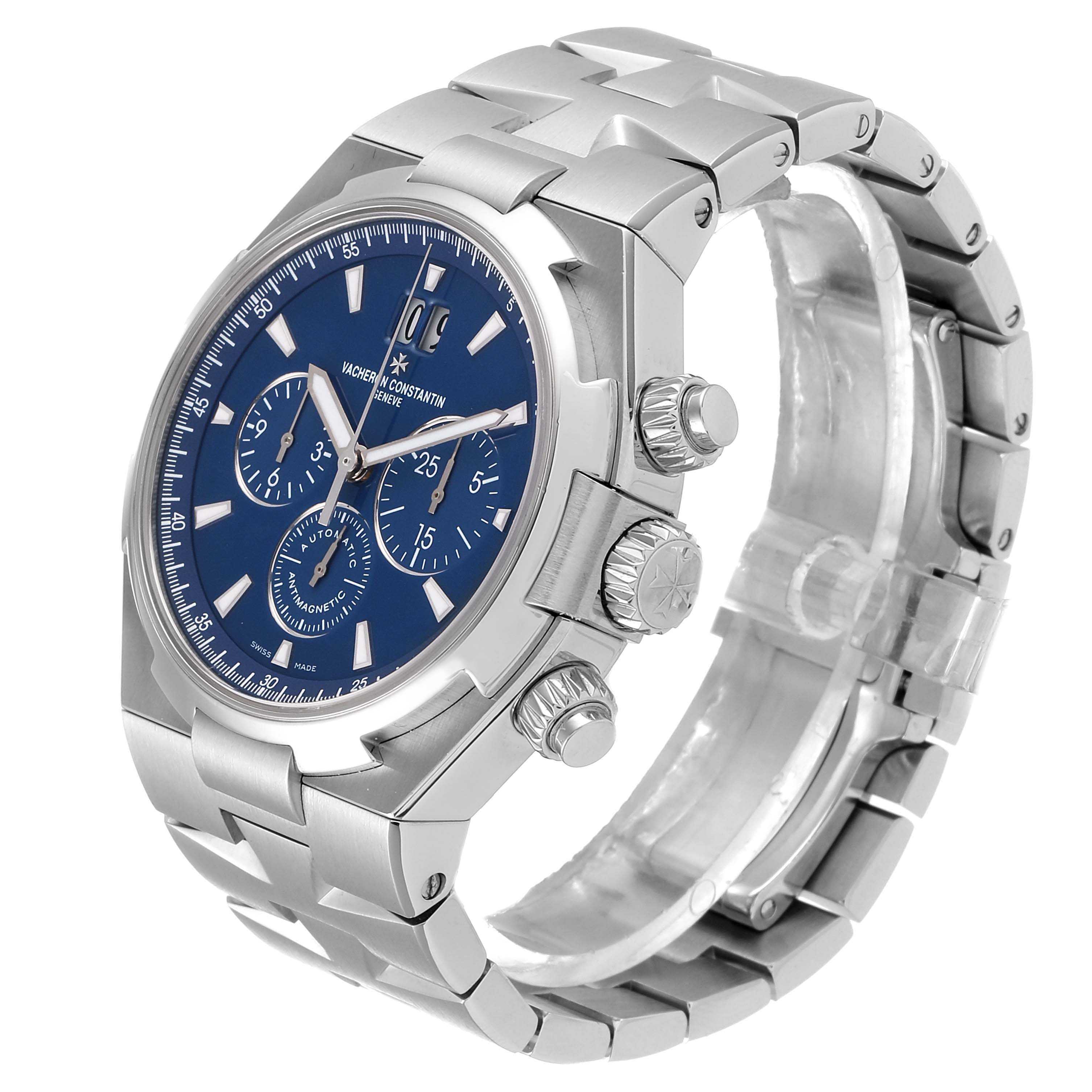 This image shows a Vacheron Constantin Overseas 49150.B01A.9097 Men's Stainless Steel Blue Dial 49150.B01A.9097 Men's Stainless Steel Blue Dial model watch from a three-quarter angle, highlighting its blue dial, chronograph sub-dials, and stainless steel bracelet.