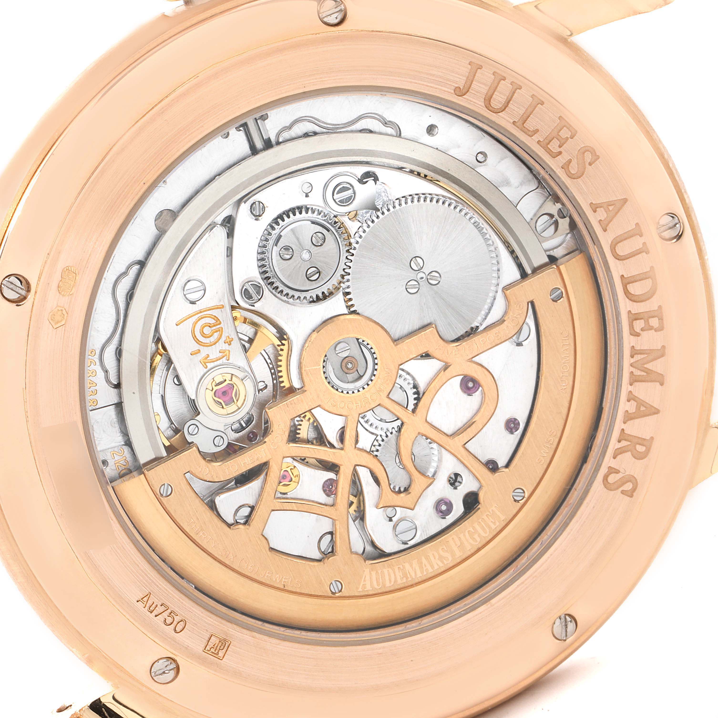 The Audemars Piguet Jules 15180OR.OO.A102CR.01 Men's Rose Gold Silver Dial model is shown from the back, displaying its intricate mechanical movement and rotor.