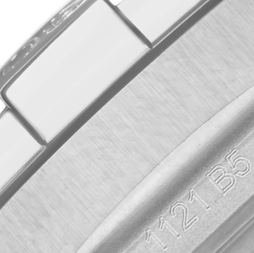 The image shows a close-up of the bracelet and part of the case edge of a Breitling Avenger A17318101C1A1 Men's Stainless Steel Blue Dial A17318101C1A1 Men's Stainless Steel Blue Dial watch.