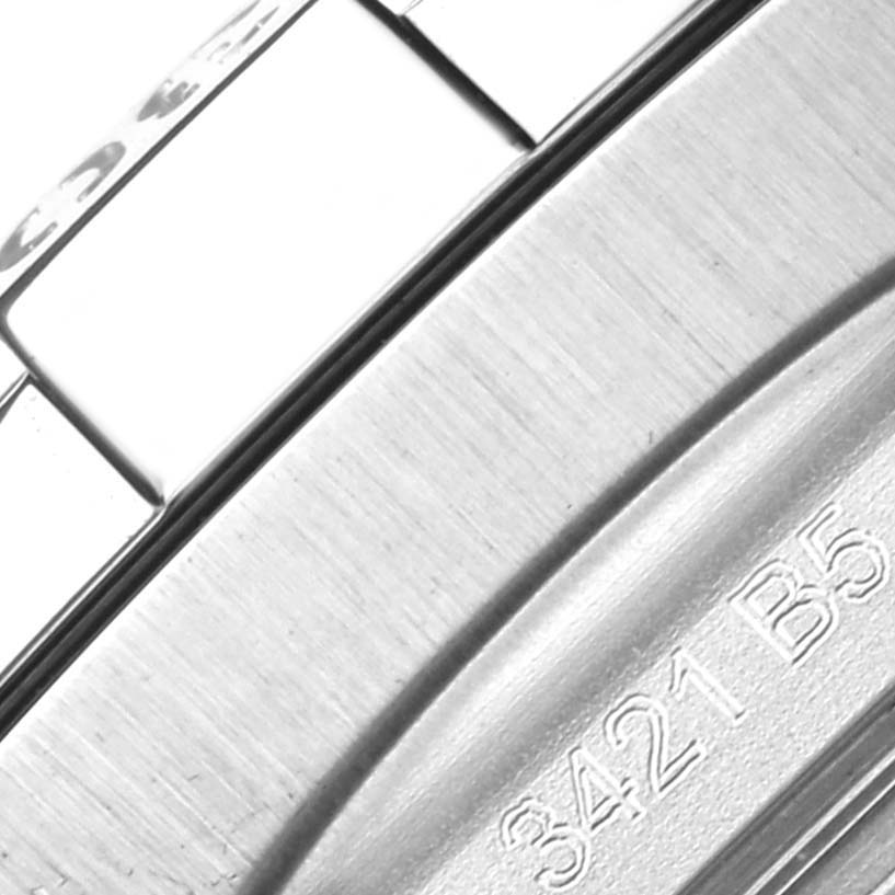 The image shows a close-up of the metal bracelet and engraved details of a Breitling Avenger A32397 Men's Stainless Steel White Dial A32397 Men's Stainless Steel White Dial watch.