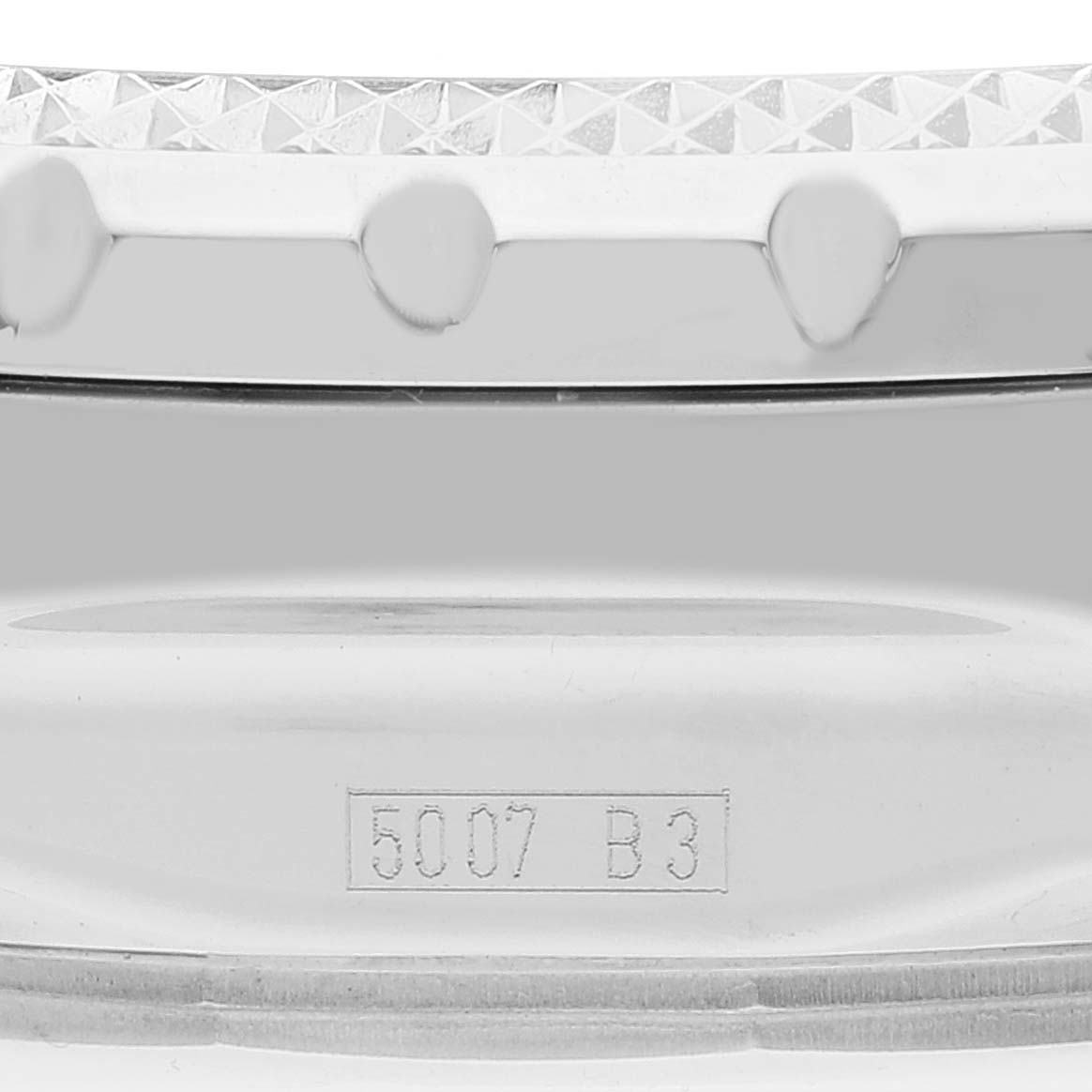 The image shows a close-up of the side of the bezel and part of the case of a Breitling Bentley A13362 Men's Stainless Steel White Dial A13362 Men's Stainless Steel White Dial watch, including its serial number.