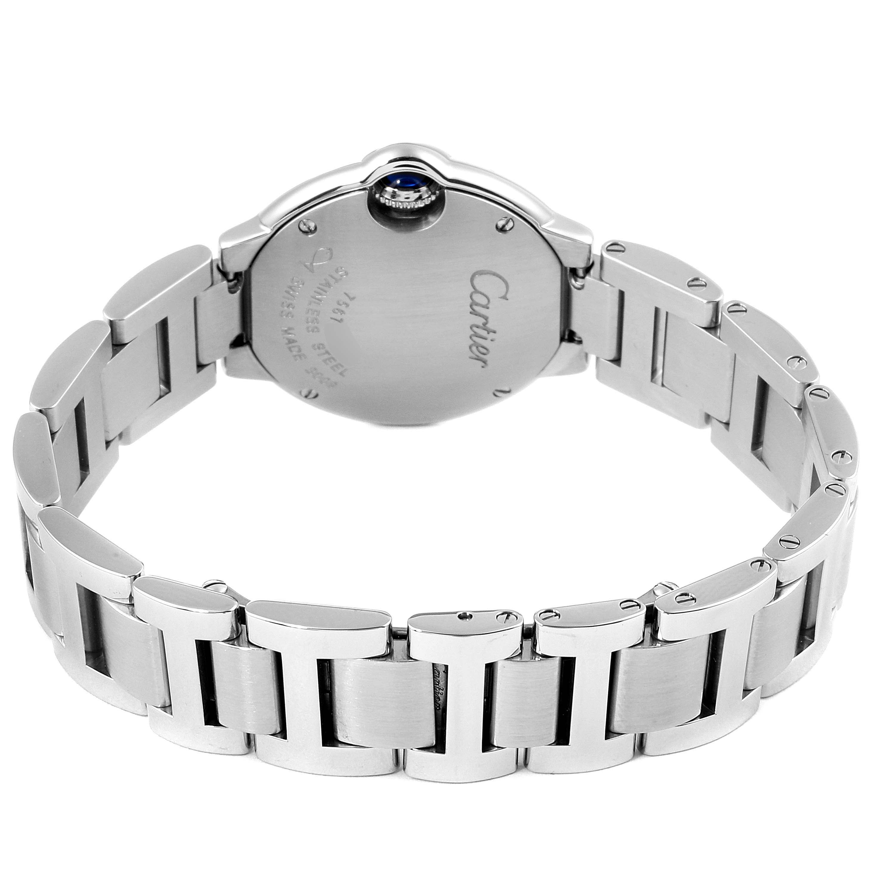 The image shows the back view of a Ballon Bleu de Cartier watch, highlighting its stainless steel bracelet and case.