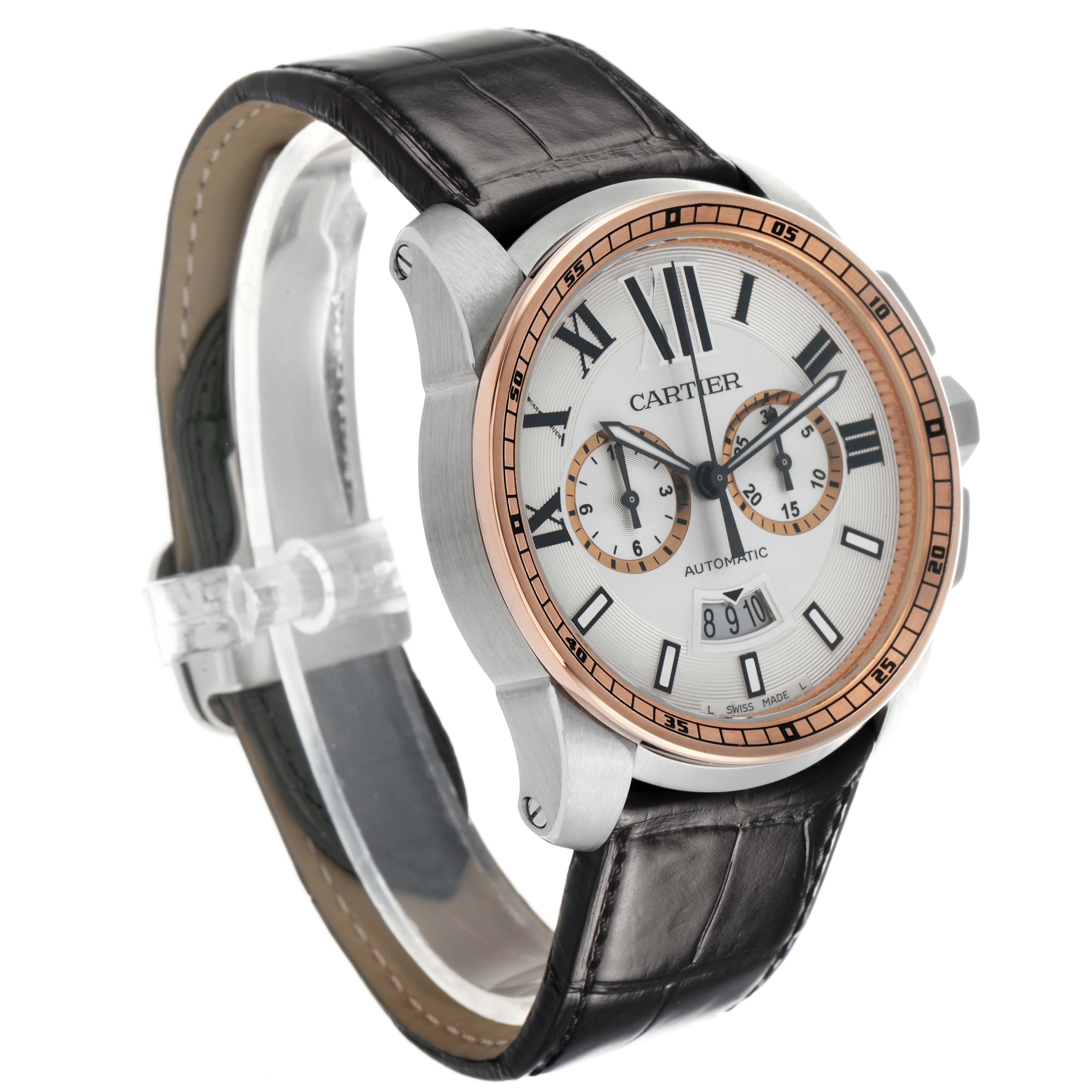 The Calibre de Cartier watch is shown at a three-quarter angle, highlighting its face, bezel, and leather strap.