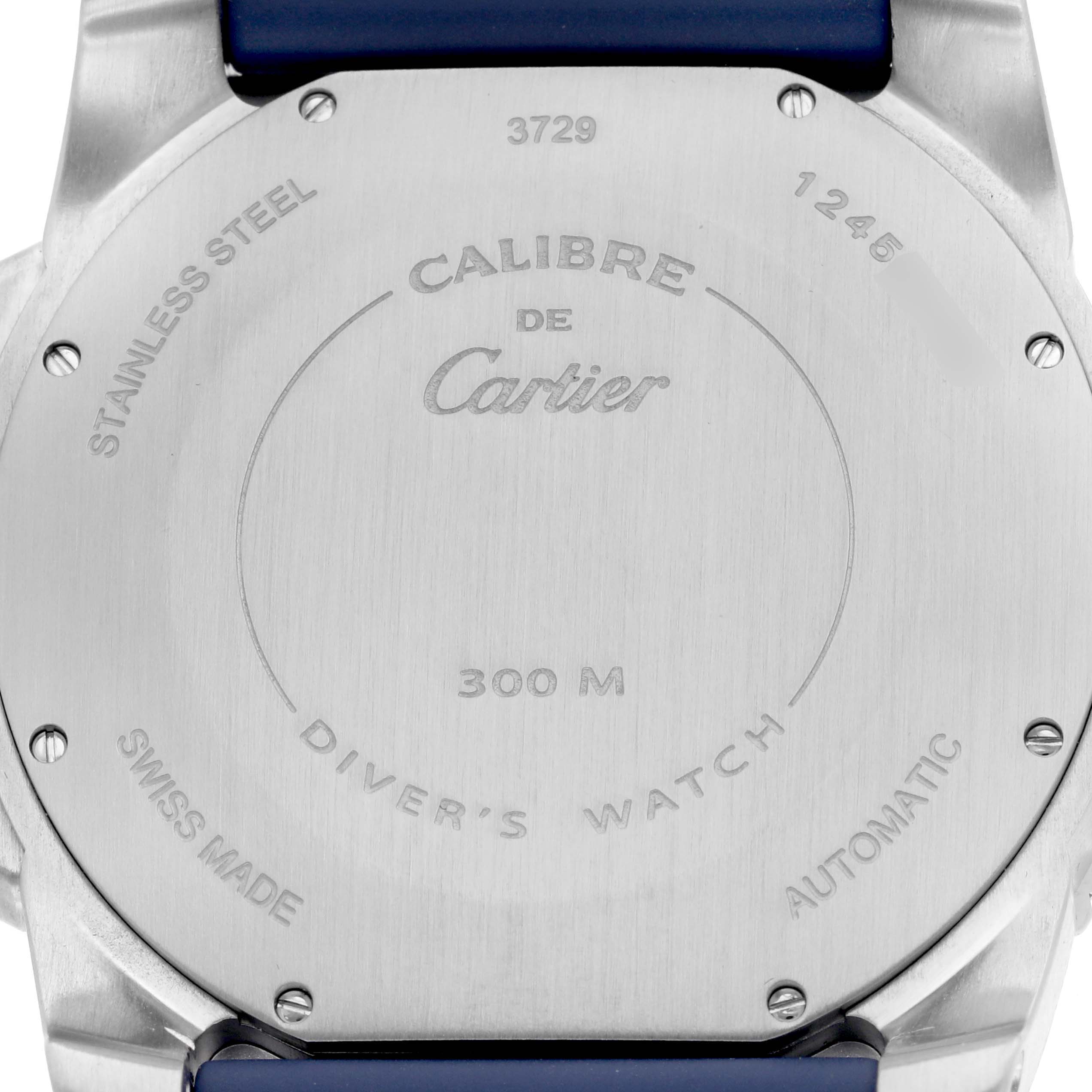 The image shows the back of a Drive de Cartier watch, highlighting its stainless steel case and engraved details.
