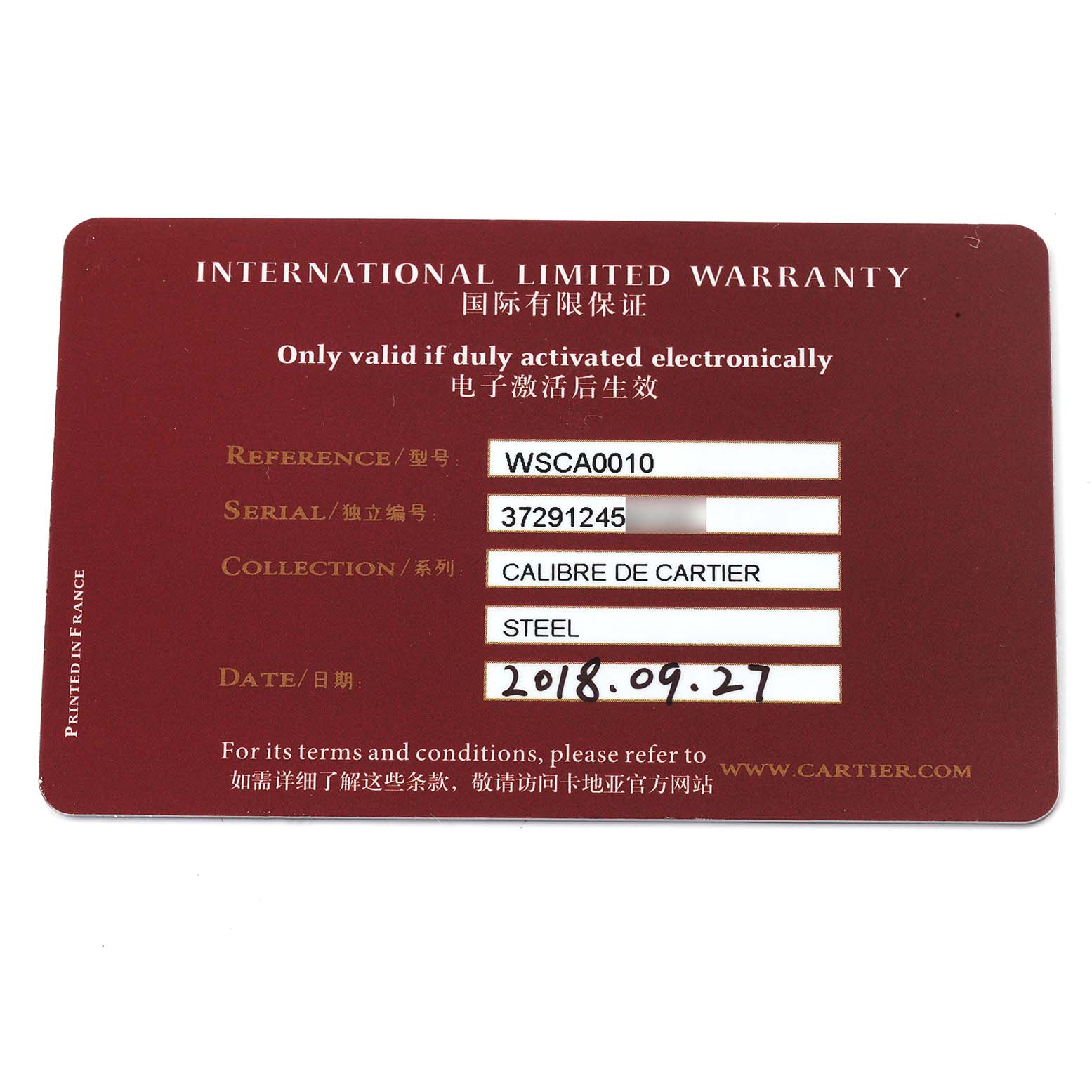 The image shows the Drive de Cartier watch
s international limited warranty card with model details.