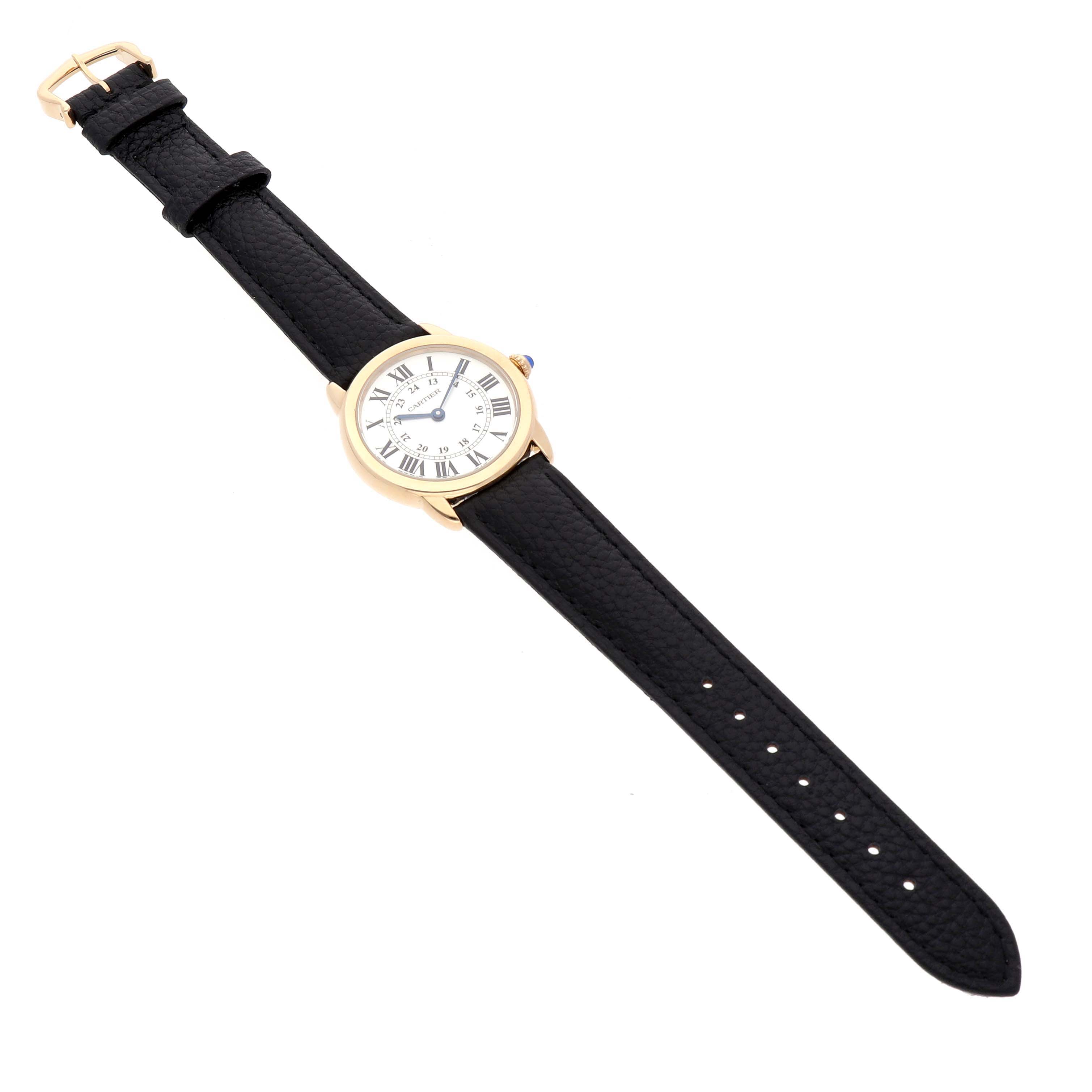 The Cartier Ronde W6700355 Women's Steel and Gold (two tone) Silver Dial watch is shown at a slight angle with its dial, case, and black leather strap visible.