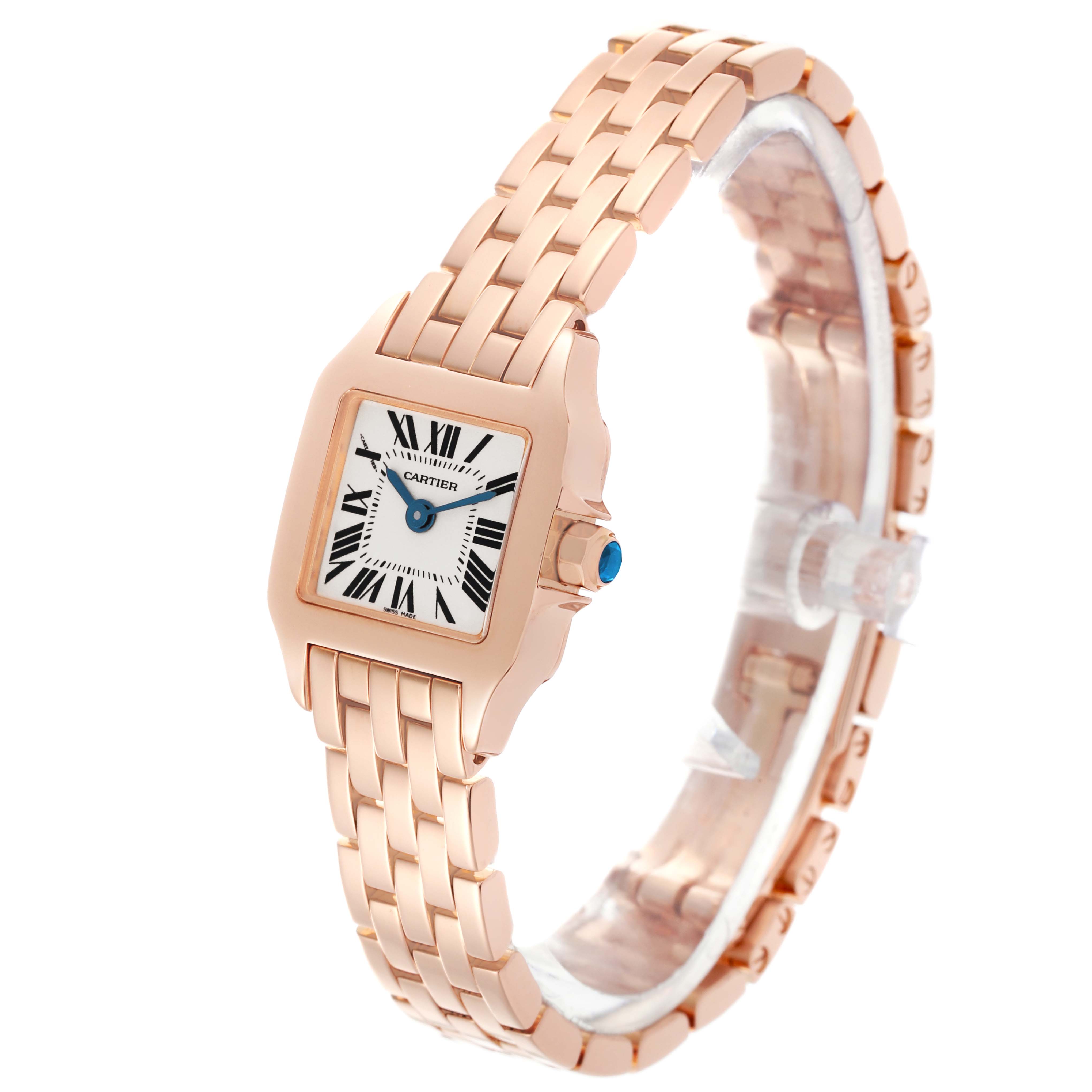 The Cartier Santos Demoiselle W25077X9 Women
s Rose Gold Silver Dial W25077X9 Women
s Rose Gold Silver Dial watch is shown at an angled side view, highlighting the case, dial, and part of the bracelet.