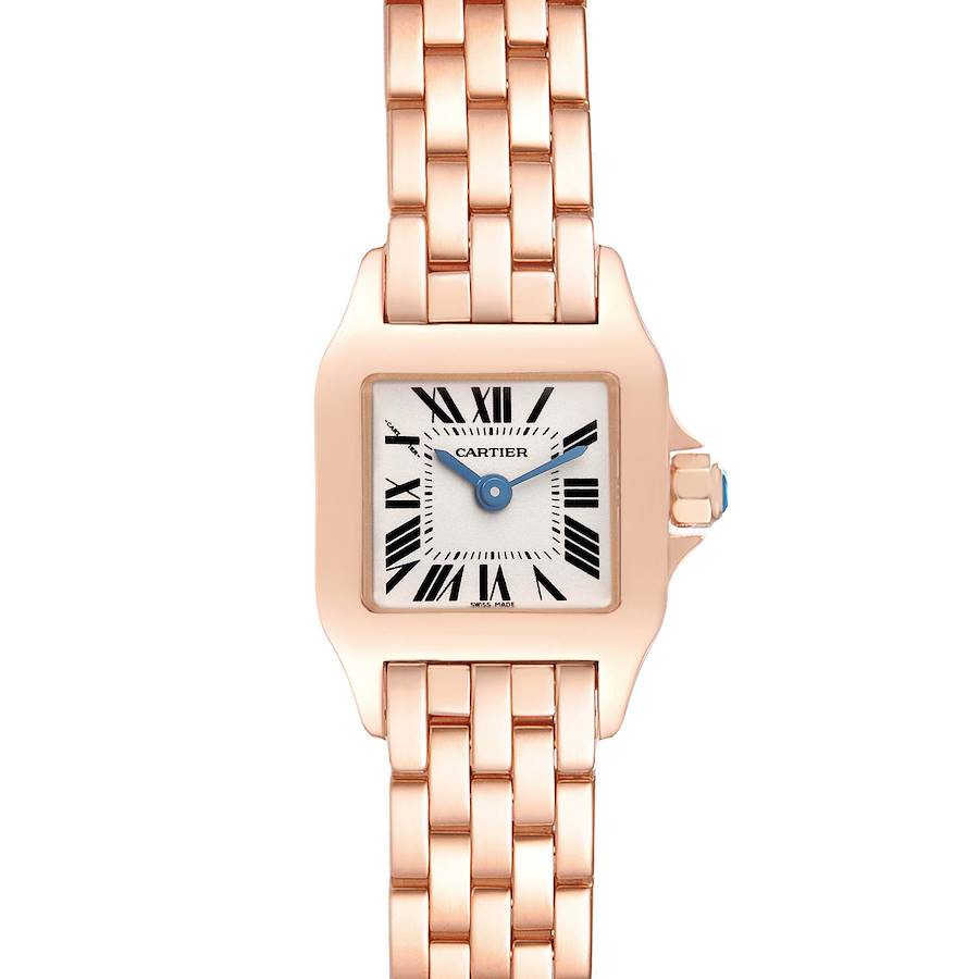 The Cartier Santos Demoiselle watch is shown from a top-down angle, highlighting the face, bezel, and bracelet.