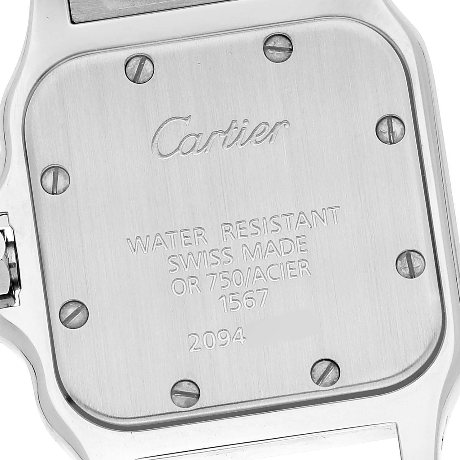 The image shows the back case of a Cartier Santos W20012C4 Women's Steel and Gold (two tone) Silver Dial W20012C4 Women's Steel and Gold (two tone) Silver Dial watch, emphasizing its engravings and screws.