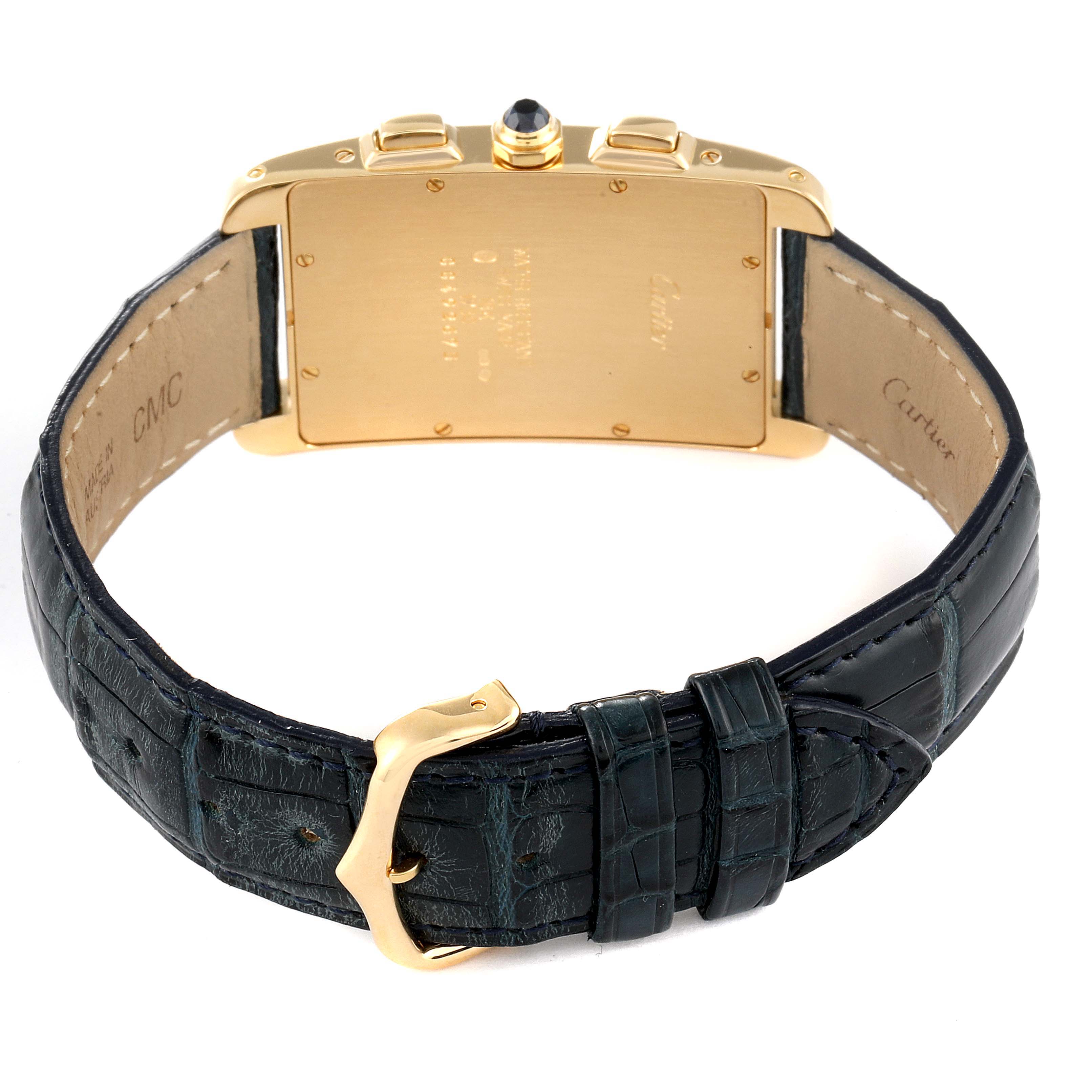 This image shows the back view of the Cartier Tank Americaine W2601156 Men
s Yellow Gold Silver Dial W2601156 Men
s Yellow Gold Silver Dial watch, focusing on the gold case, strap, and buckle.