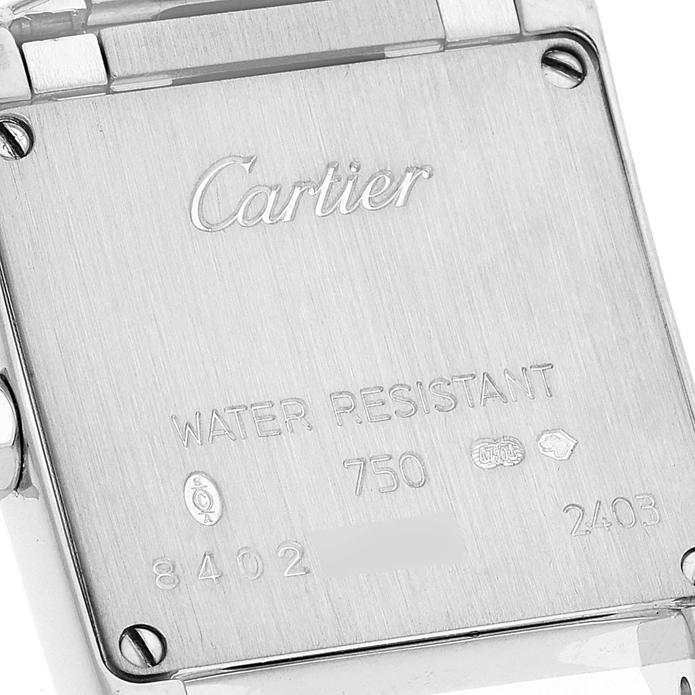 The image shows the back case of a Cartier Tank Francaise WE1002S3 Women's White Gold Silver Dial WE1002S3 Women's White Gold Silver Dial watch, depicting its inscriptions and markings.