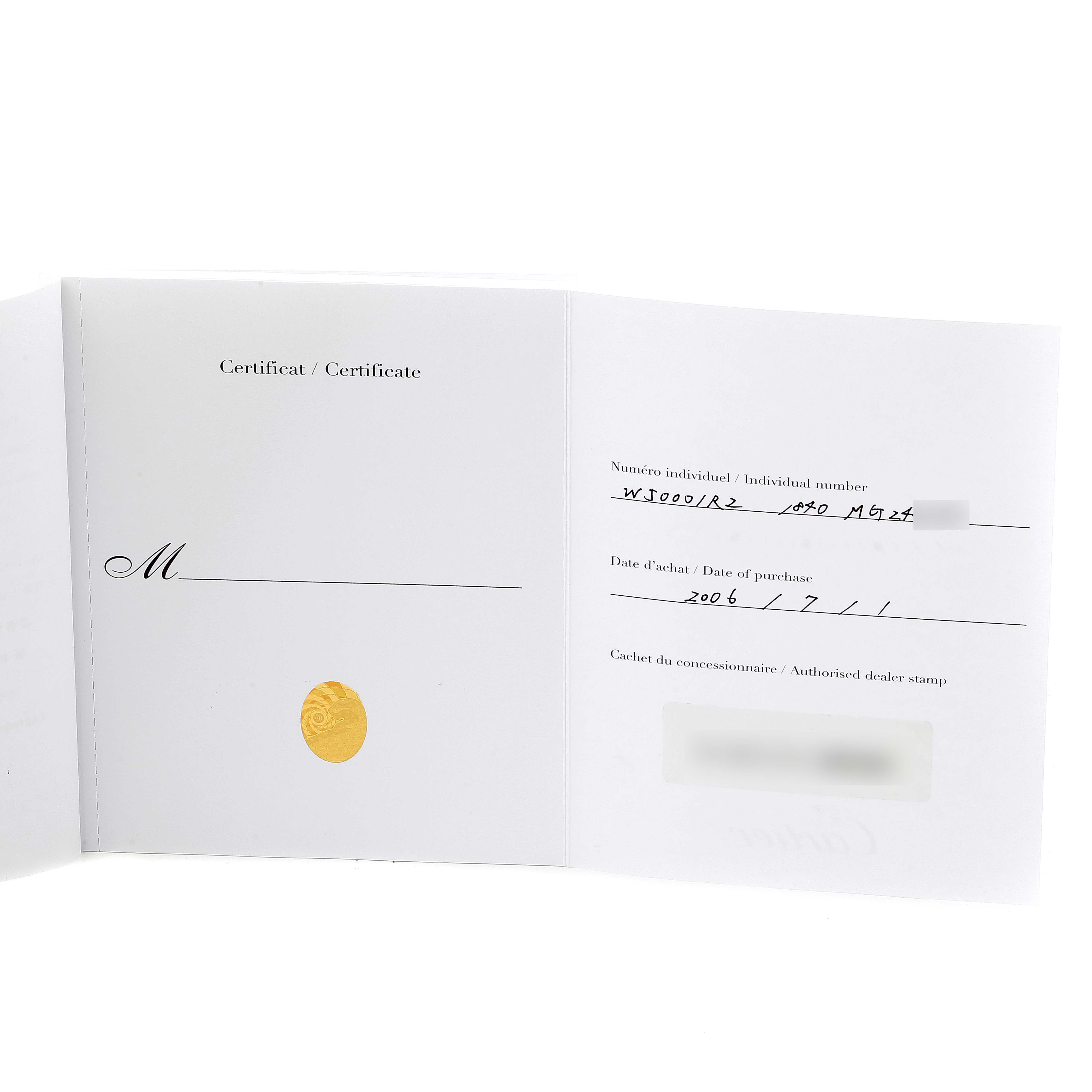 The image shows an open certificate booklet for the Cartier Tank Française watch, displaying the individual number, date of purchase, and dealer stamp sections.