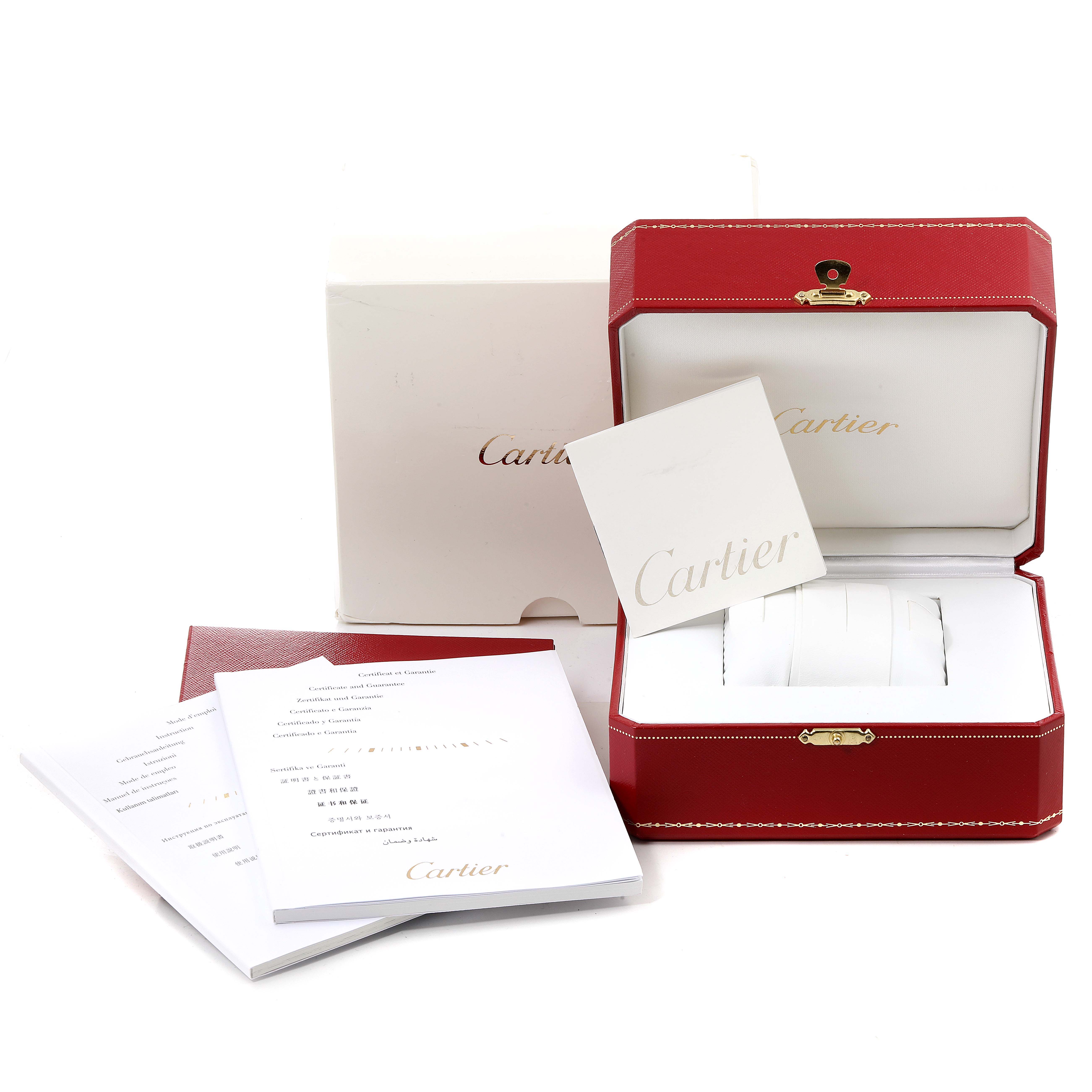 The image shows the packaging, manuals, and box for the Tank Francaise model by Cartier, with no watch visible.