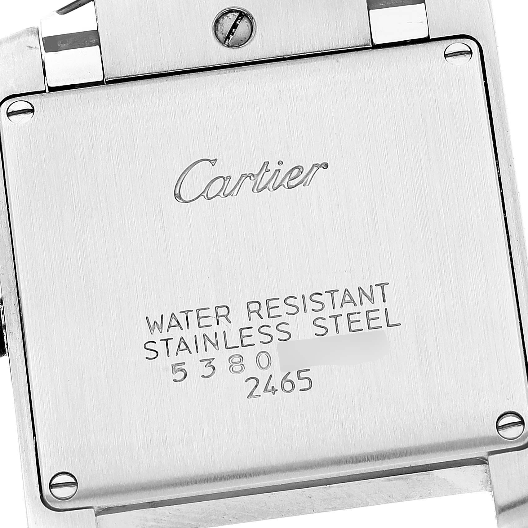 The image shows the back case of a Cartier Tank Francaise W51011Q3 Women's Stainless Steel Silver Dial W51011Q3 Women's Stainless Steel Silver Dial watch, highlighting its water resistance and stainless steel material.
