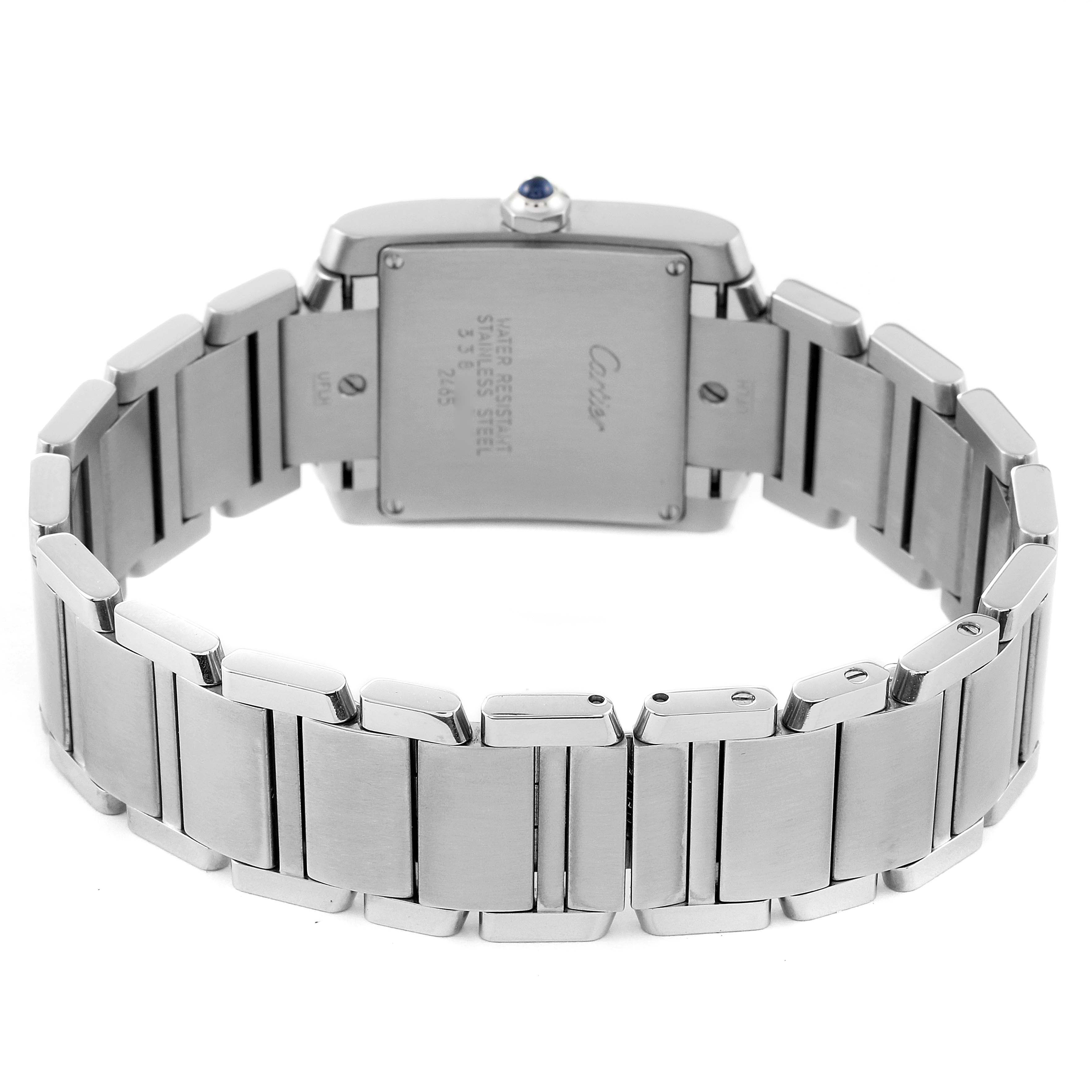The image shows the back view of a Cartier Tank Française watch, displaying its bracelet and caseback.