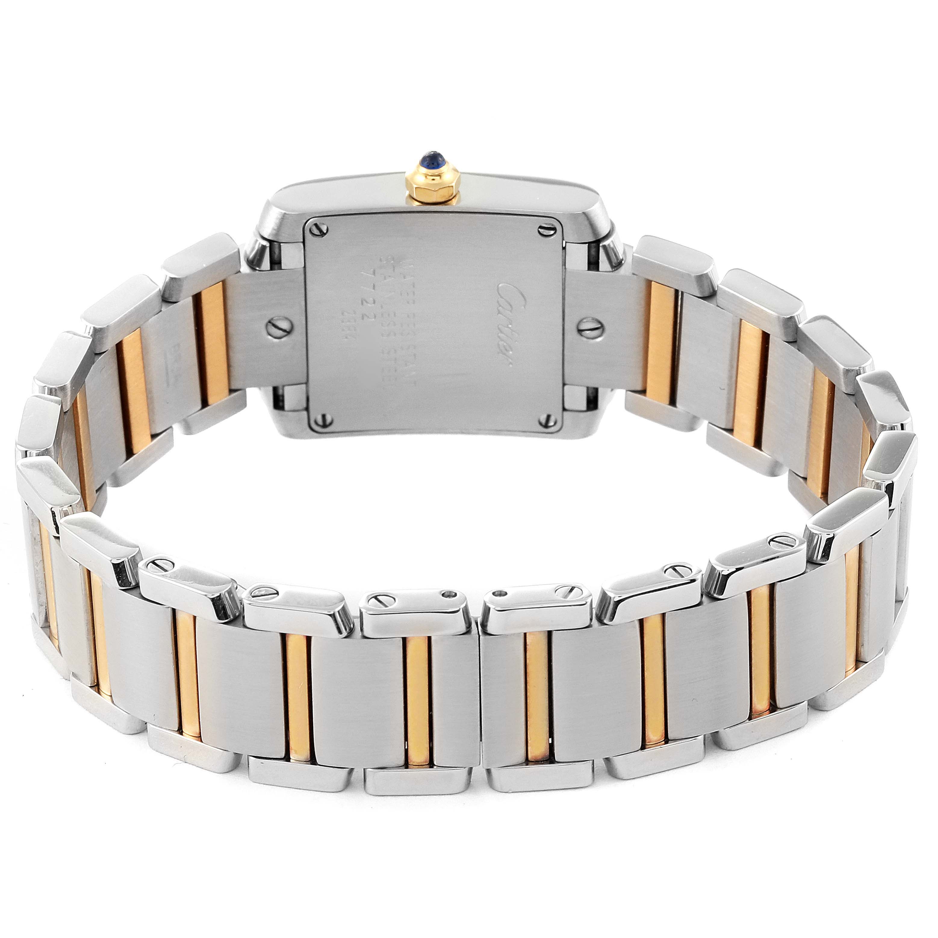 The image shows the back view of a Cartier Tank Francaise W51007Q4 Women's Steel and Gold (two tone) Silver Dial W51007Q4 Women's Steel and Gold (two tone) Silver Dial watch, highlighting the metal bracelet with gold accents and case back.