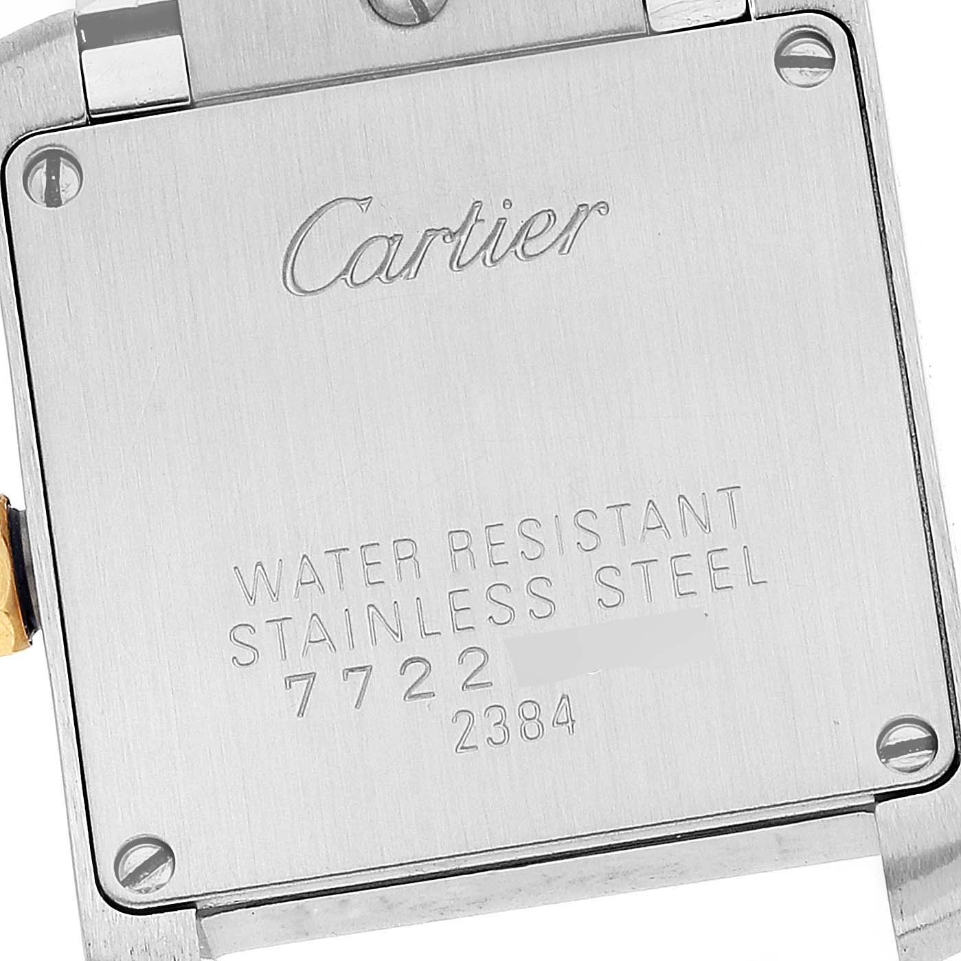 This image shows the back case of a Cartier Tank Française watch, highlighting its water resistance and stainless steel construction.