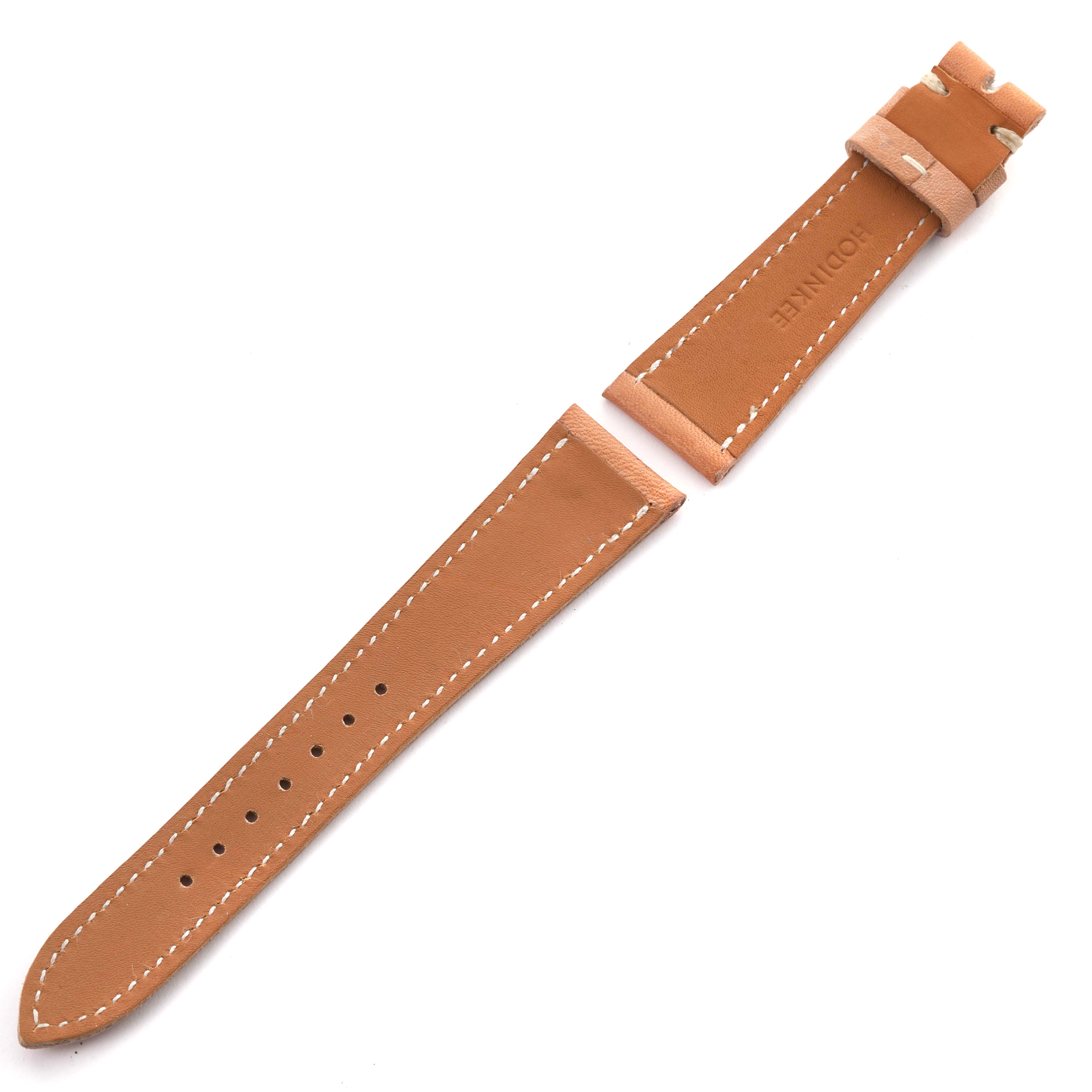 The image shows two tan leather straps of the Corum Coin Watch 4414556 Men's Yellow Gold Champagne Dial 4414556 Men's Yellow Gold Champagne Dial, displaying stitching and buckle feature.