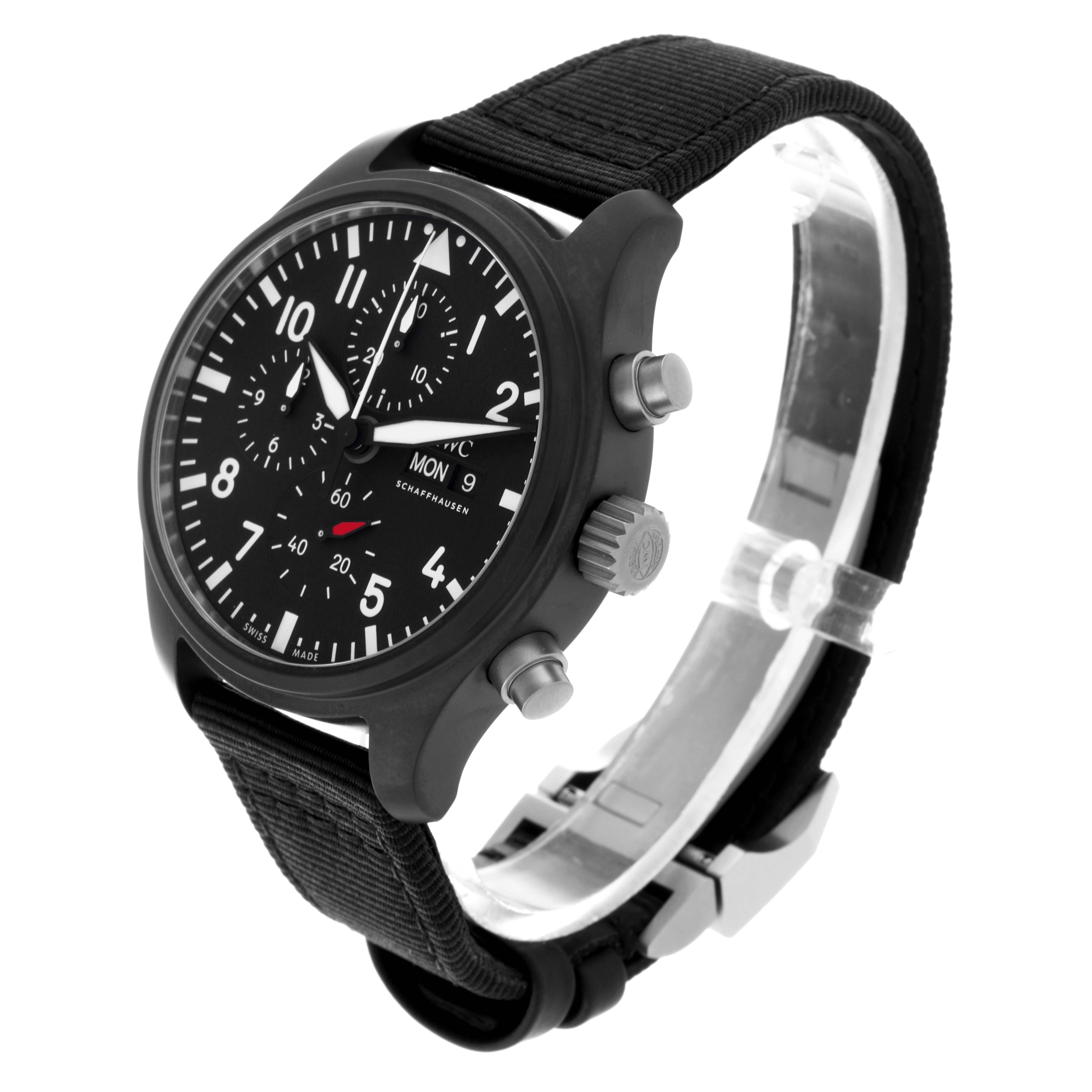 The IWC Pilot IW389101 Men's Ceramic Black Dial IW389101 Men's Ceramic Black Dial watch is shown at a three-quarter angle displaying the dial, case, crown, pushers, and strap.