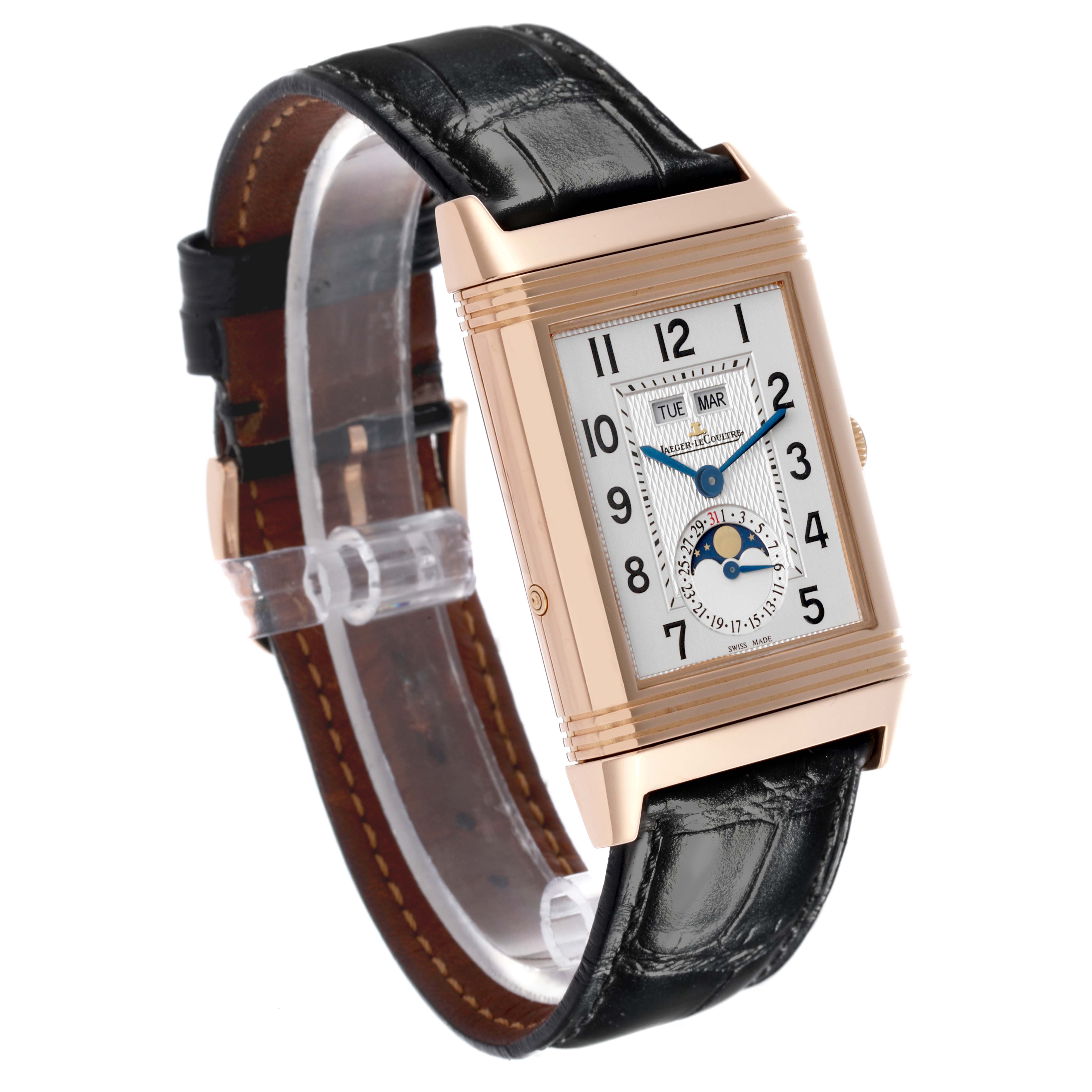 The Jaeger LeCoultre Reverso Q3752520 Men's Rose Gold Silver Dial Q3752520 Men's Rose Gold Silver Dial watch is shown at a 3/4 angle, highlighting its rectangular case, dial, and black leather strap.