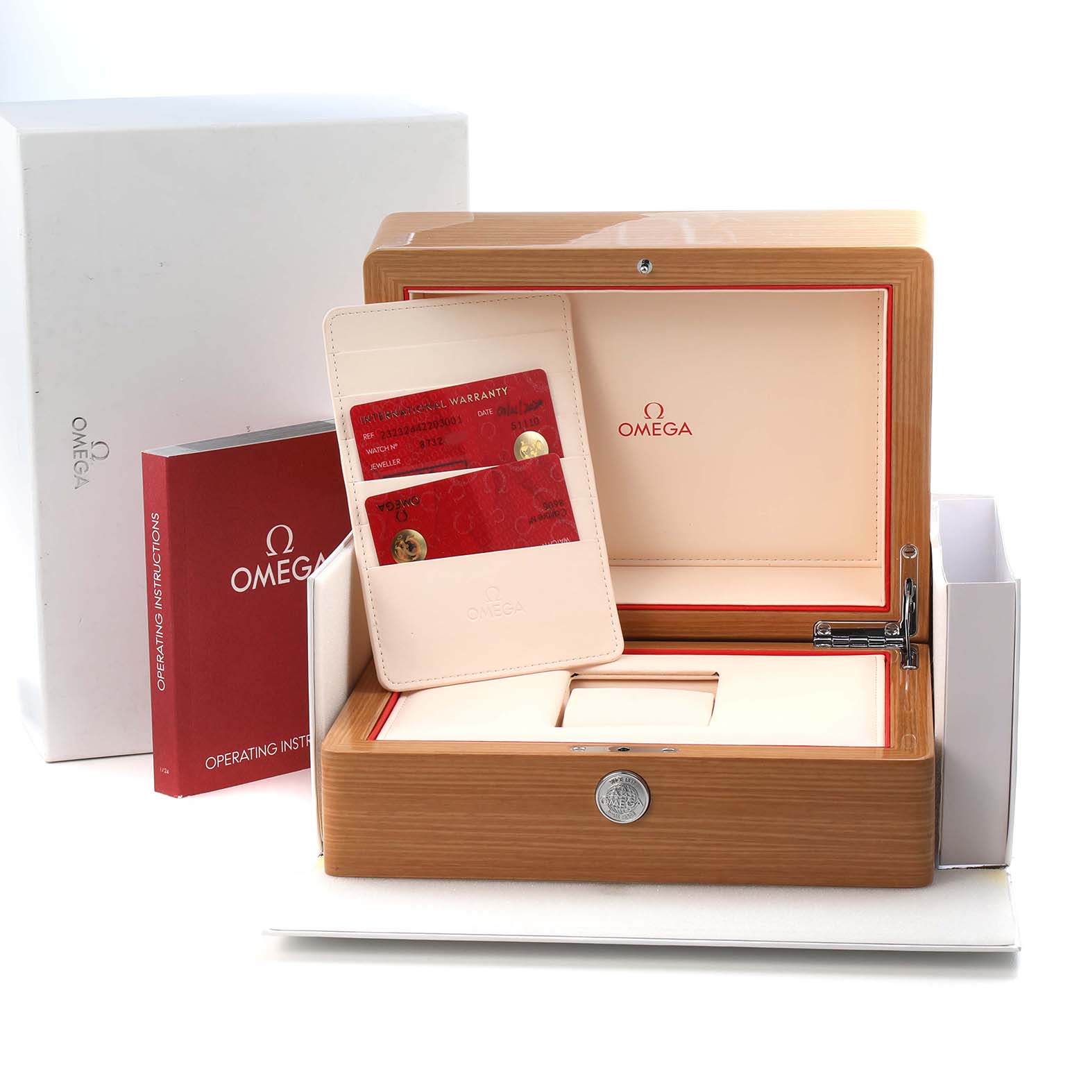 The image shows an open wooden box for an Omega Seamaster 232.32.44.22.03.001 Men's Stainless Steel Blue Dial, with warranty cards, a red manual, and outer packaging visible.