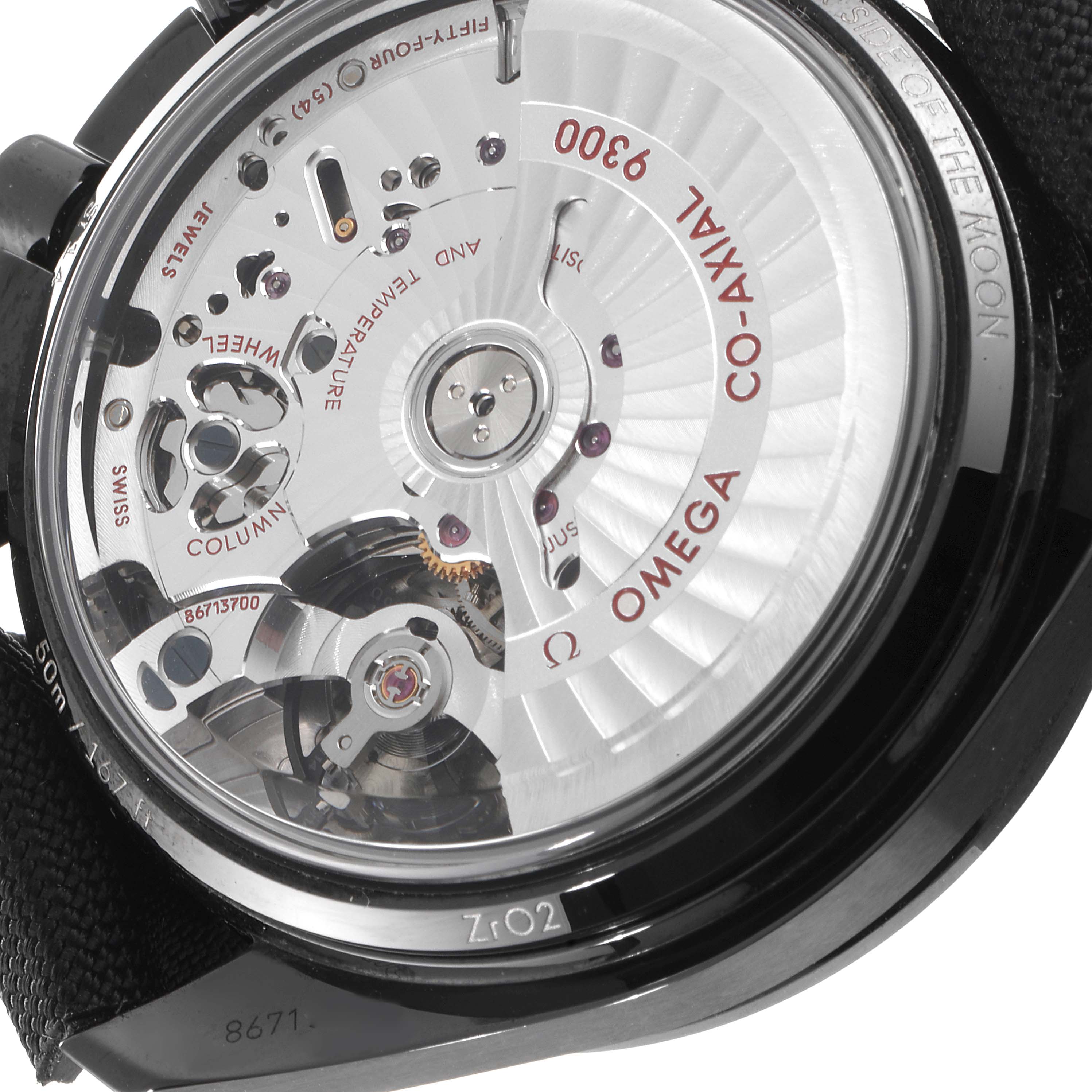 The image shows the back view of the Omega Speedmaster 311.92.44.51.01.003 Men's Ceramic Black Dial 311.92.44.51.01.003 Men's Ceramic Black Dial watch, highlighting its Co-Axial 9300 movement and intricate internal mechanics.