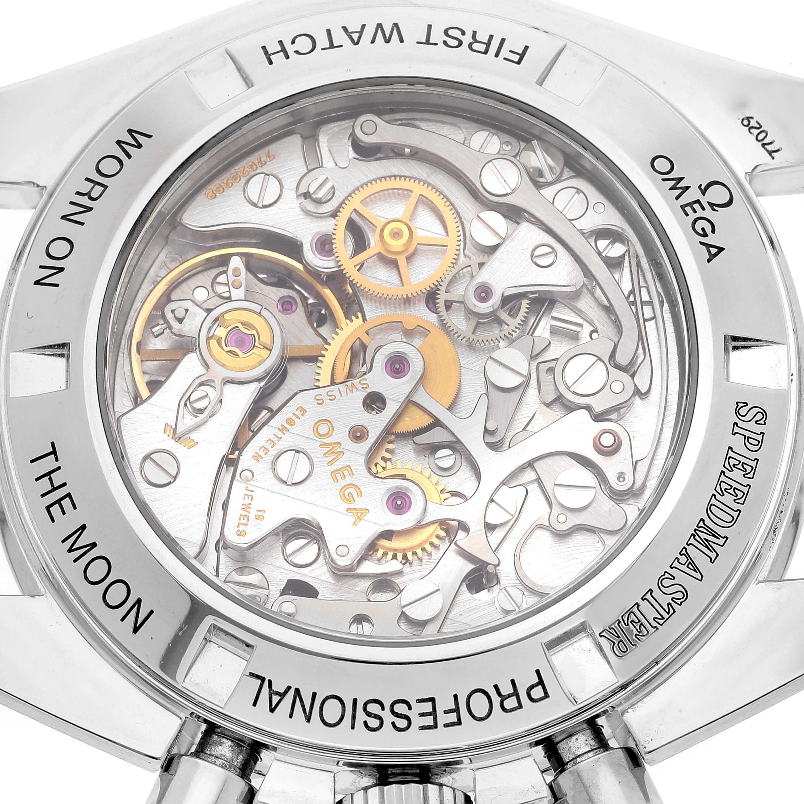 This is a close-up view of the Omega Speedmaster 3572.50.00 Men's Stainless Steel Black Dial 3572.50.00 Men's Stainless Steel Black Dial watch, focusing on the intricate mechanical movement and internal components.