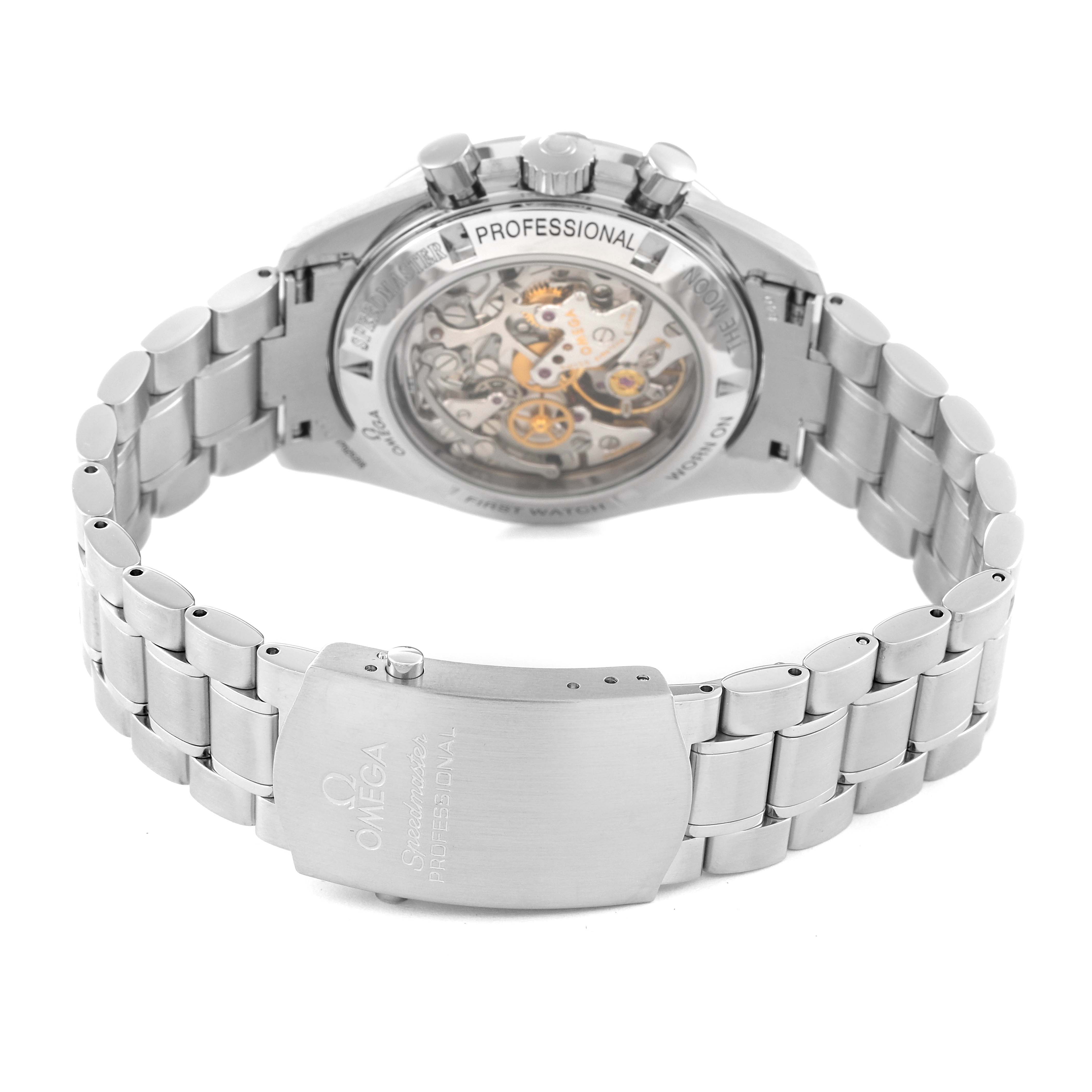 The image shows the back of the Omega Speedmaster 3572.50.00 Men's Stainless Steel Black Dial 3572.50.00 Men's Stainless Steel Black Dial watch, highlighting the mechanical movement and metal bracelet.