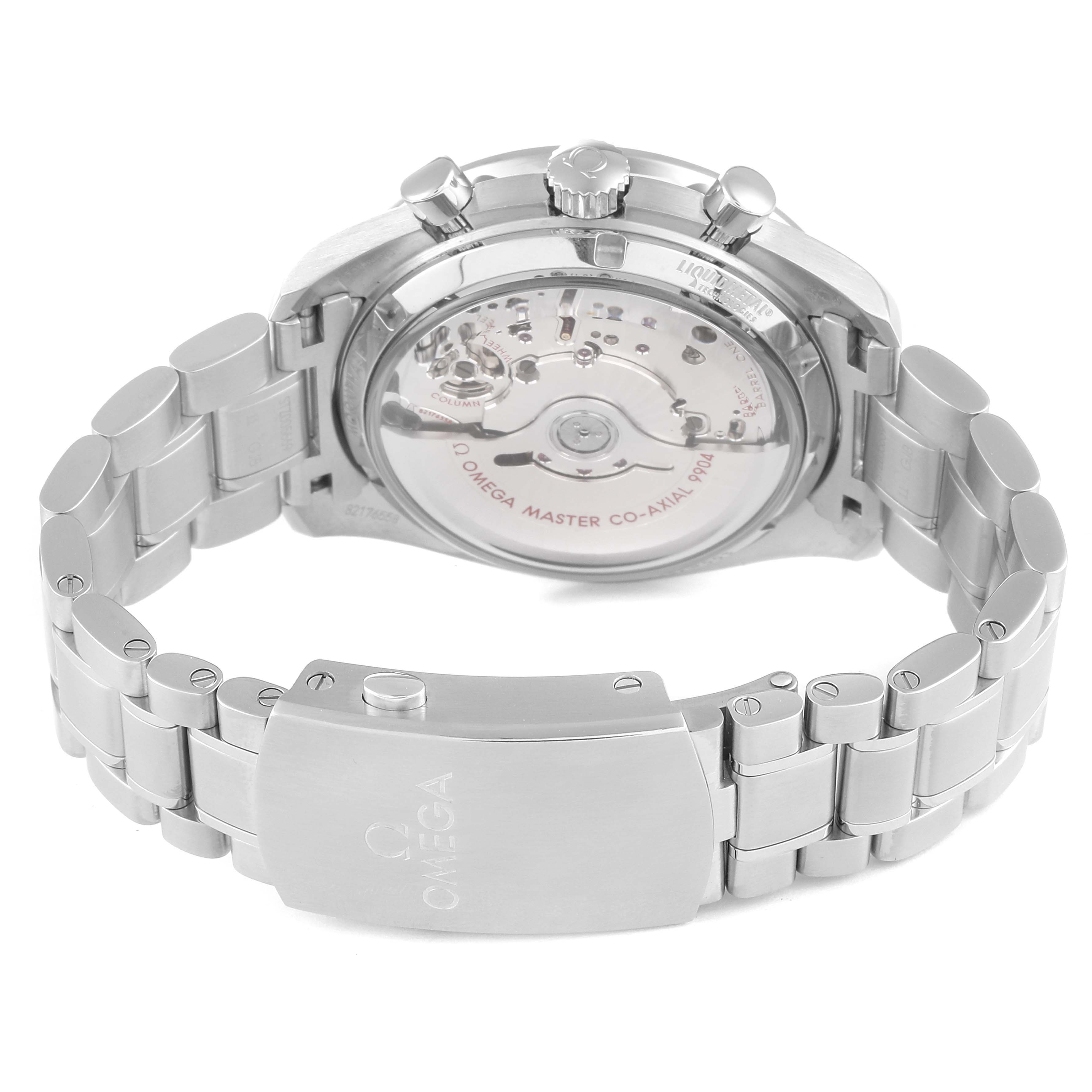 The image shows the back and clasp of an Omega Speedmaster 304.30.44.52.01.001 Men
s Stainless Steel Black Dial 304.30.44.52.01.001 Men
s Stainless Steel Black Dial watch, highlighting the movement and bracelet.