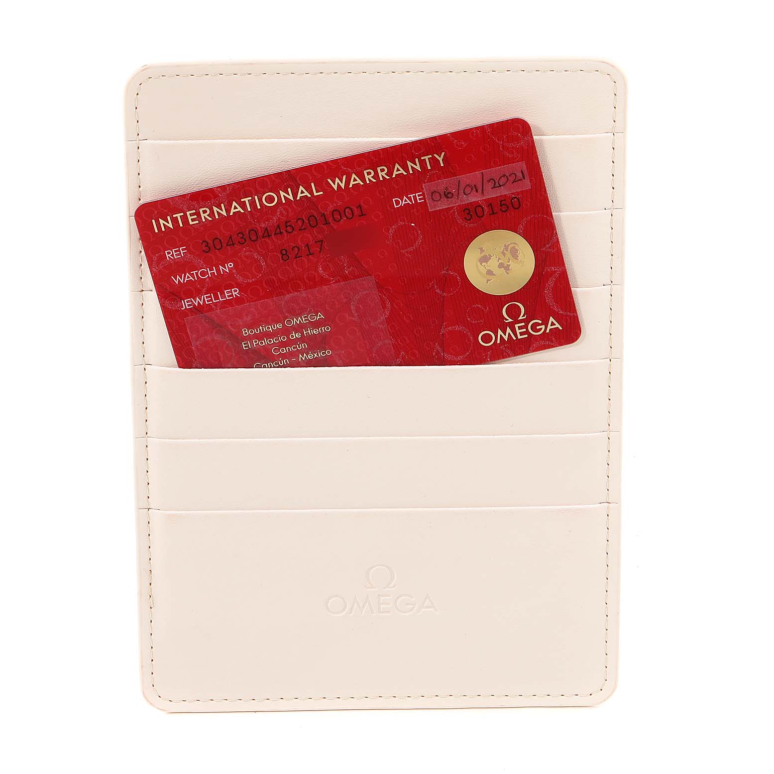 The image shows an Omega Speedmaster 304.30.44.52.01.001 Men
s Stainless Steel Black Dial 304.30.44.52.01.001 Men
s Stainless Steel Black Dial
s international warranty card in a white cardholder from a top view.