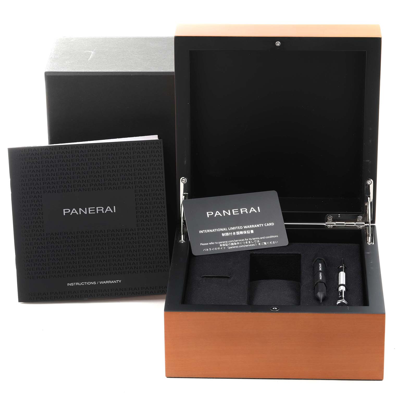 The image shows an open Panerai Luminor PAM01033 Men's Stainless Steel Blue Dial PAM01033 Men's Stainless Steel Blue Dial watch box with a warranty card, instructions booklet, and tools pack.