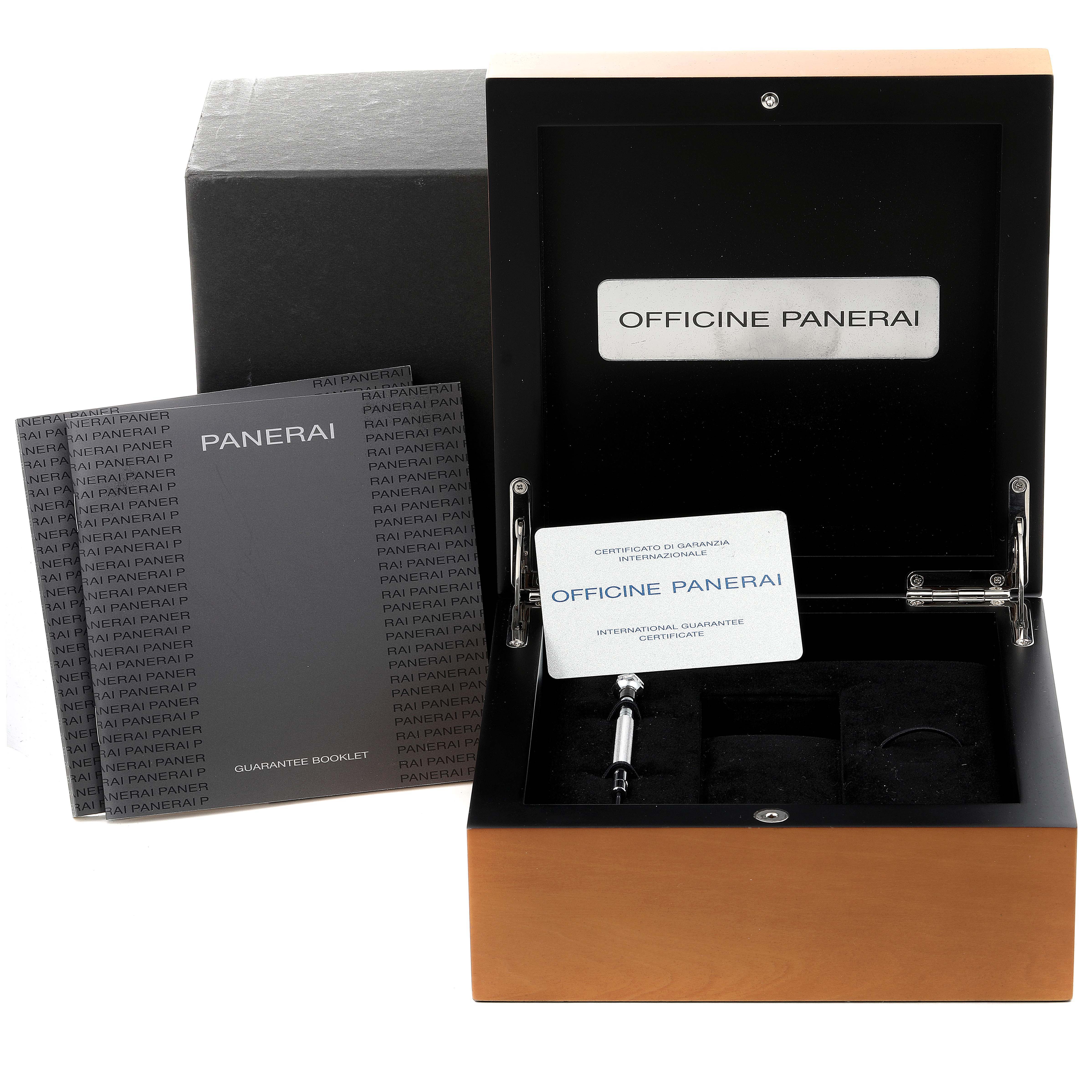 This image shows the open box, guarantee booklet, and accessories for a Panerai Luminor PAM00000 Men's Stainless Steel Black Dial PAM00000 Men's Stainless Steel Black Dial watch.