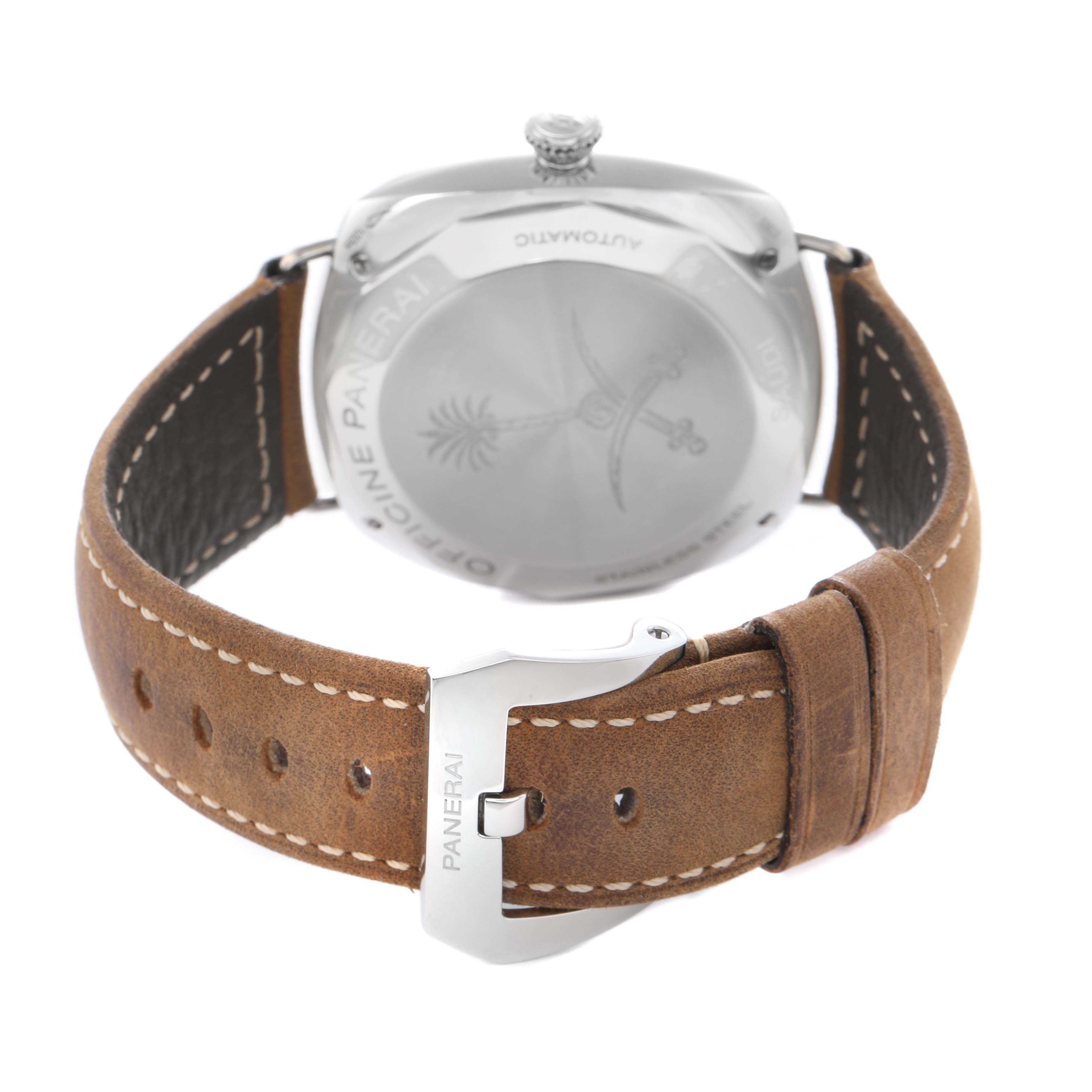 The image shows the back view of the Panerai Radiomir PAM00473 men's watch, highlighting the case back, crown, and brown leather strap with a buckle clasp.