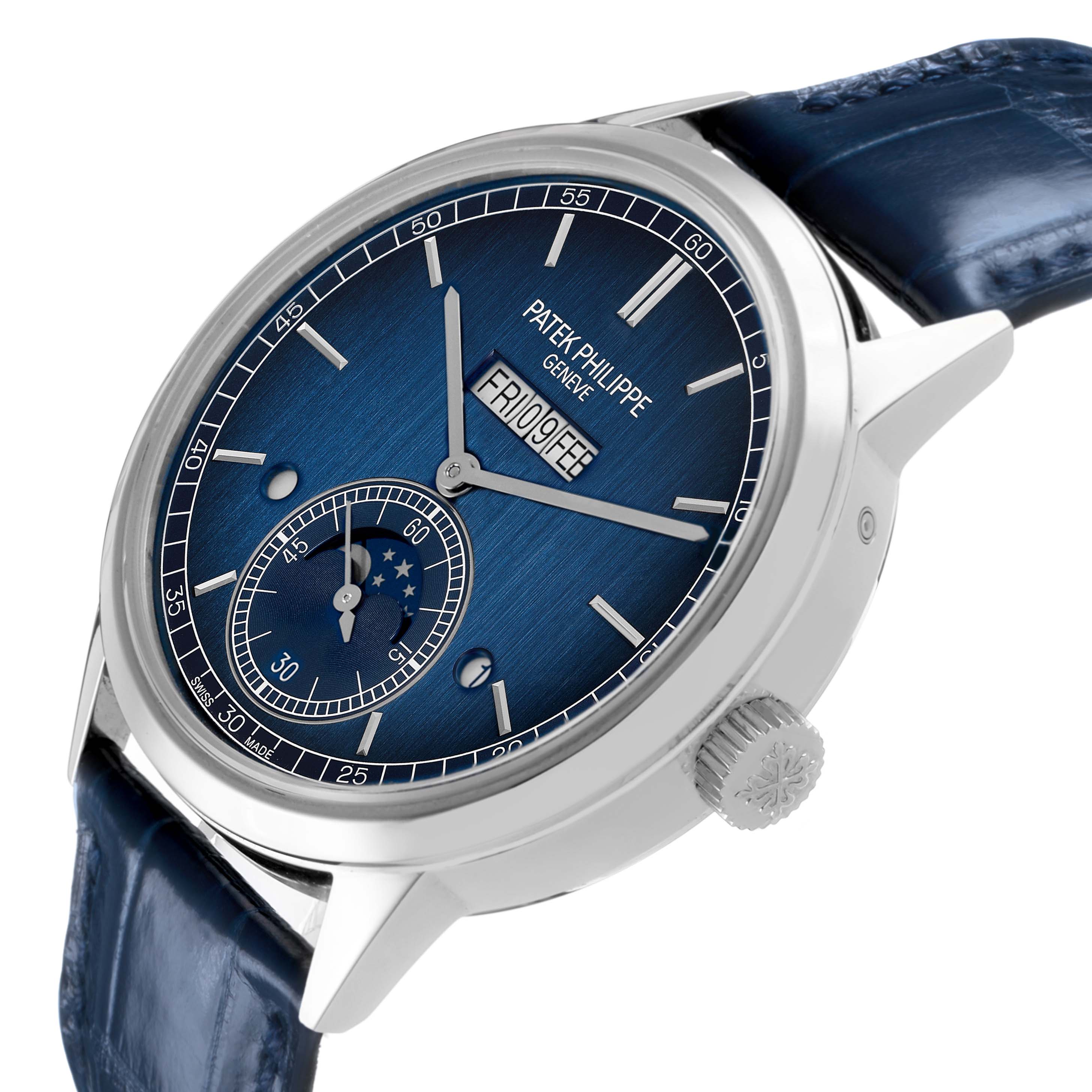 The image shows a Patek Philippe Complications 5236 Men's Platinum Blue Dial watch at a slight side angle, highlighting the blue dial, hands, subdial, crown, and strap.