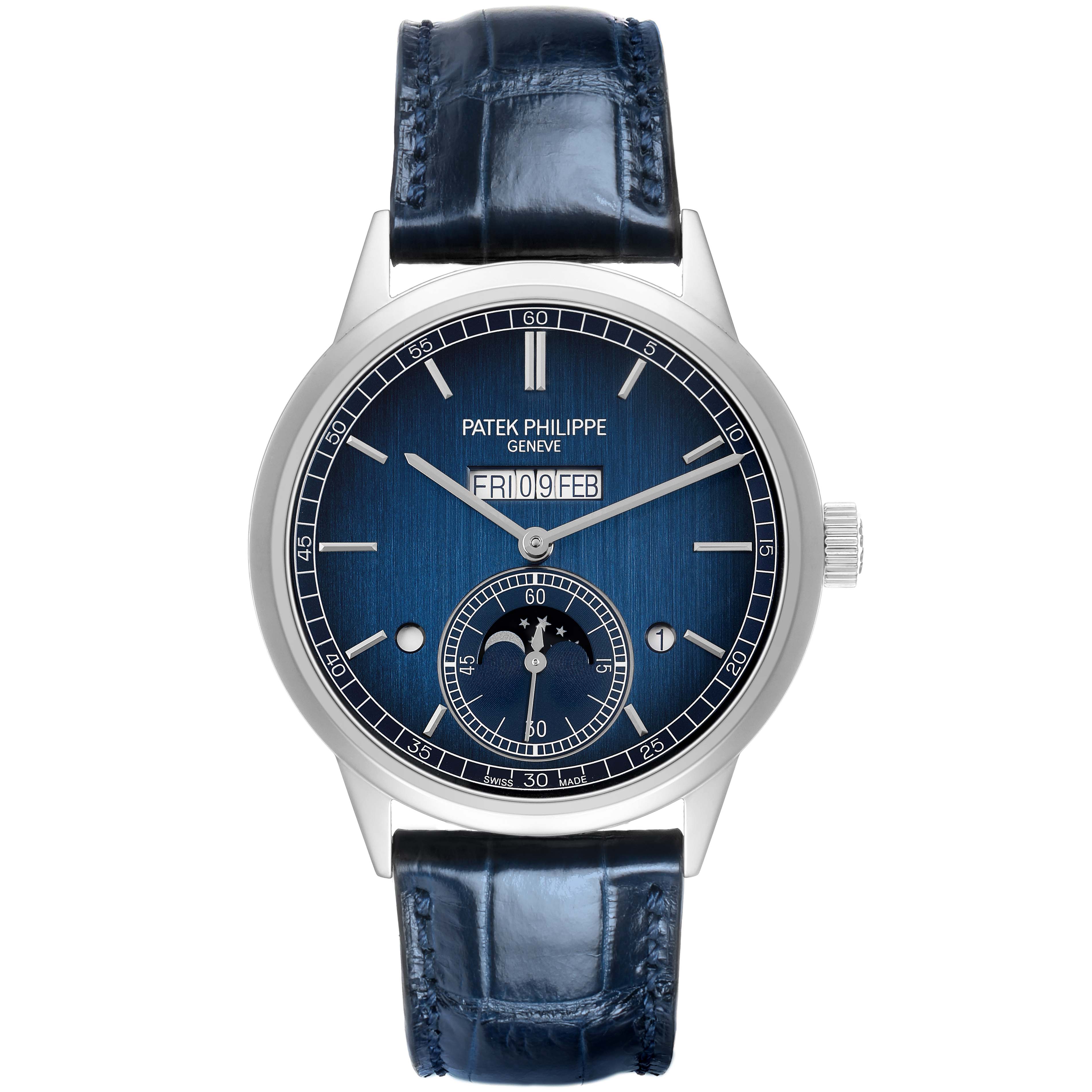 The image shows a front view of the Patek Philippe Complications 5236 Men's Platinum Blue Dial watch, highlighting the blue dial, date display, and leather strap.
